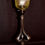 Thumbnail: Stylish Arts and Crafts wrought iron table lamp with vaseline glass shade