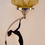 Thumbnail: Art Deco Chrome Silhouette Lady Table Lamp with matching amber starburst shade