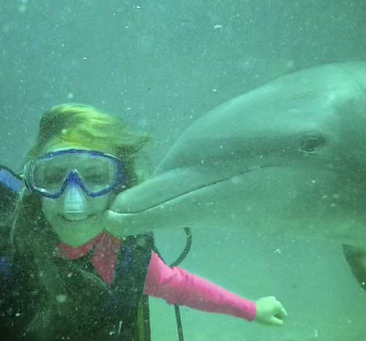 Alex petite luxury escort kissing dolphin scuba diving Park City Utah