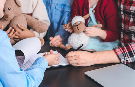 Social worker meeting with couple for signing adoption documents.jpg