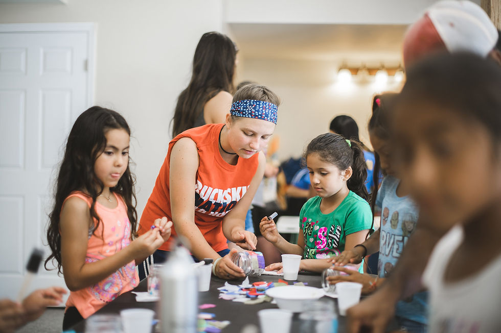 Metzler Mennonite students assisted in a candle-making workshop for kids at Camp Skillz Madison. 