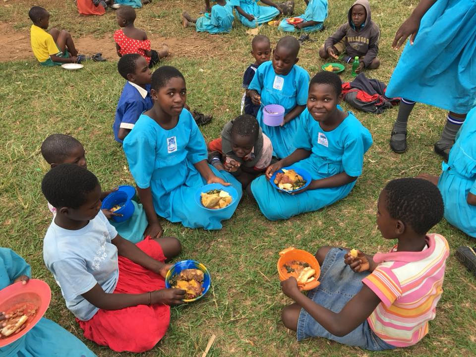 As you can see in this picture, children are receiving colorful plates of nutritious food! 