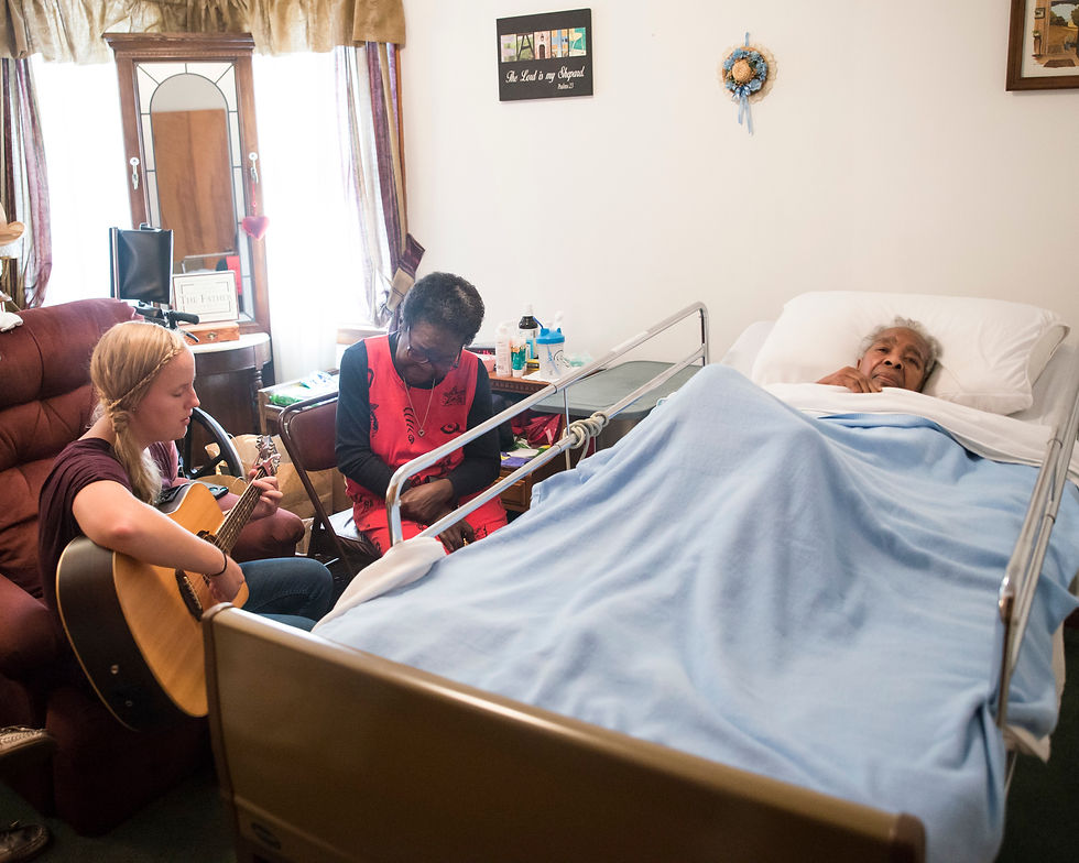 Anna Hastings, a student at the Institute for GOD, shares a song with one of our neighbors in Hopewell. Anna serves the elderly in Hopewell in a number of ways, and one of those ways is providing comfort through music.