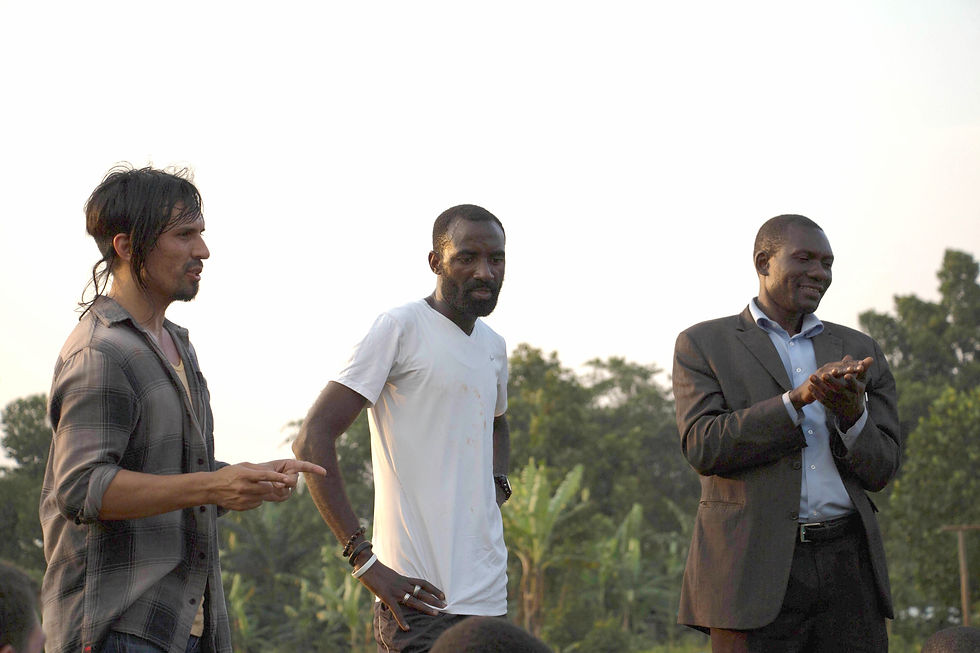 Gregg Garner, John Nyago, and the headmaster of St. John's in the summer of 2014 when our partnership with St. John's formally began.