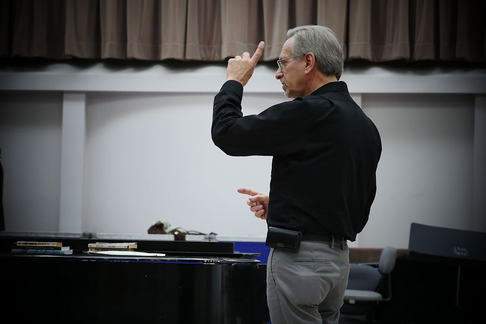 D-cueing at piano.JPG