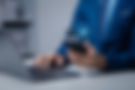 businessman-is-holding-smartphone-with-hologram-manipulating-smartphone-control-manipulati