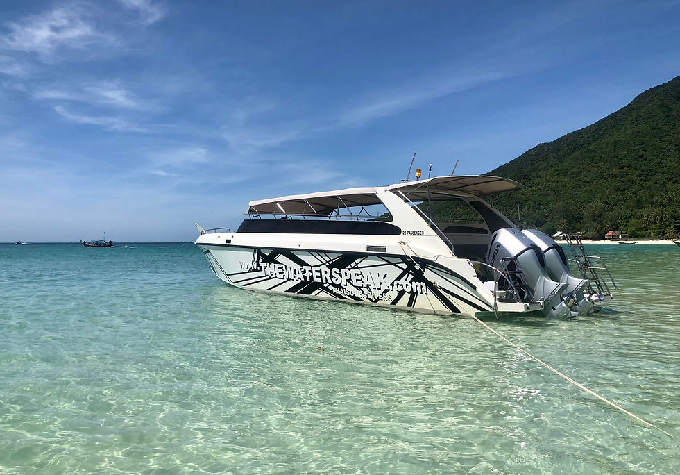 Walee, our speedboat, moored in clear blue waters