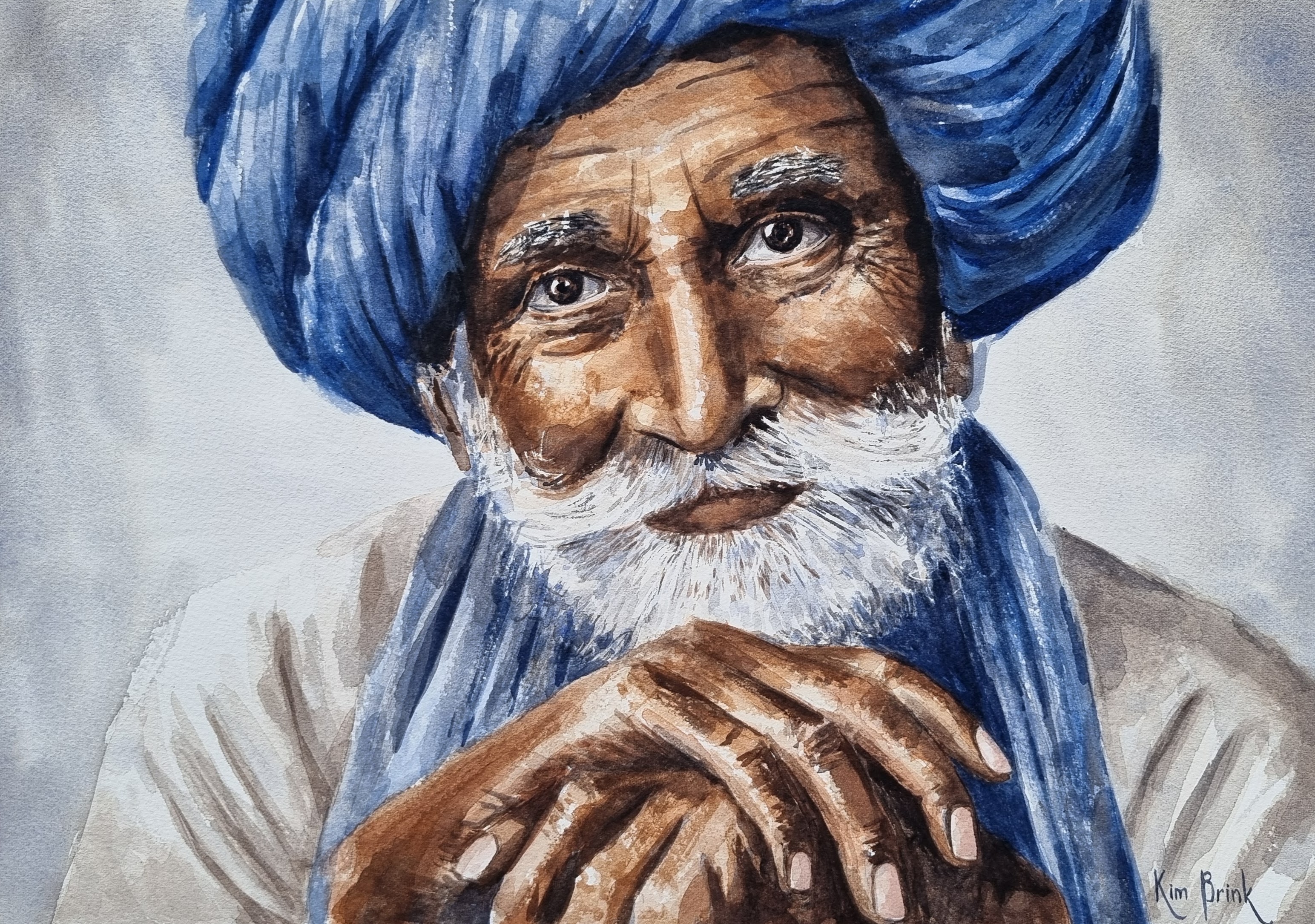 Bapu by Kim Brink, an elderly man in a blue turban with a gentle smile