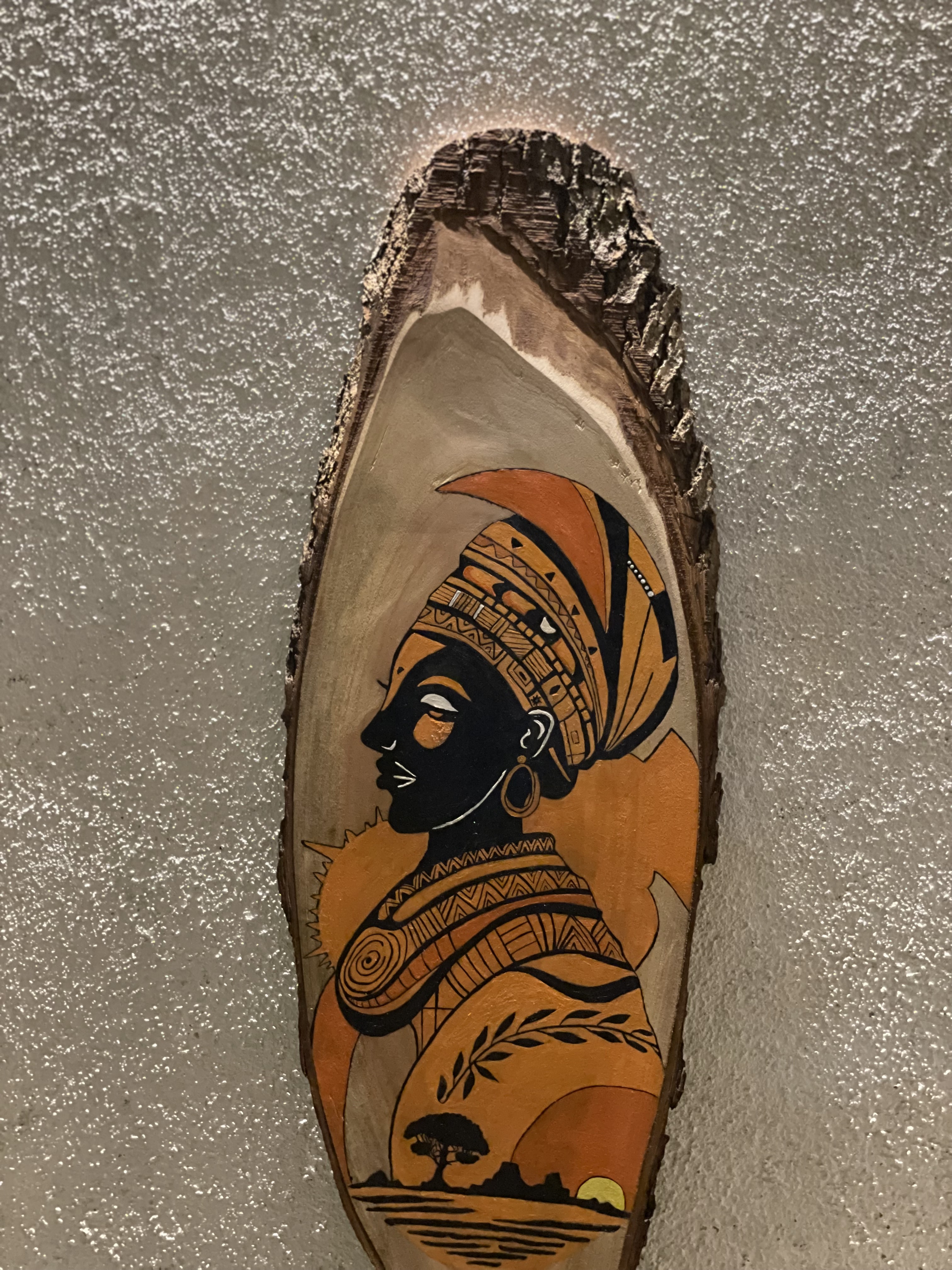 Acrylic painting: wood art by Kaveesha Dissanayaka, featuring a detailed portrait of an African Queen
