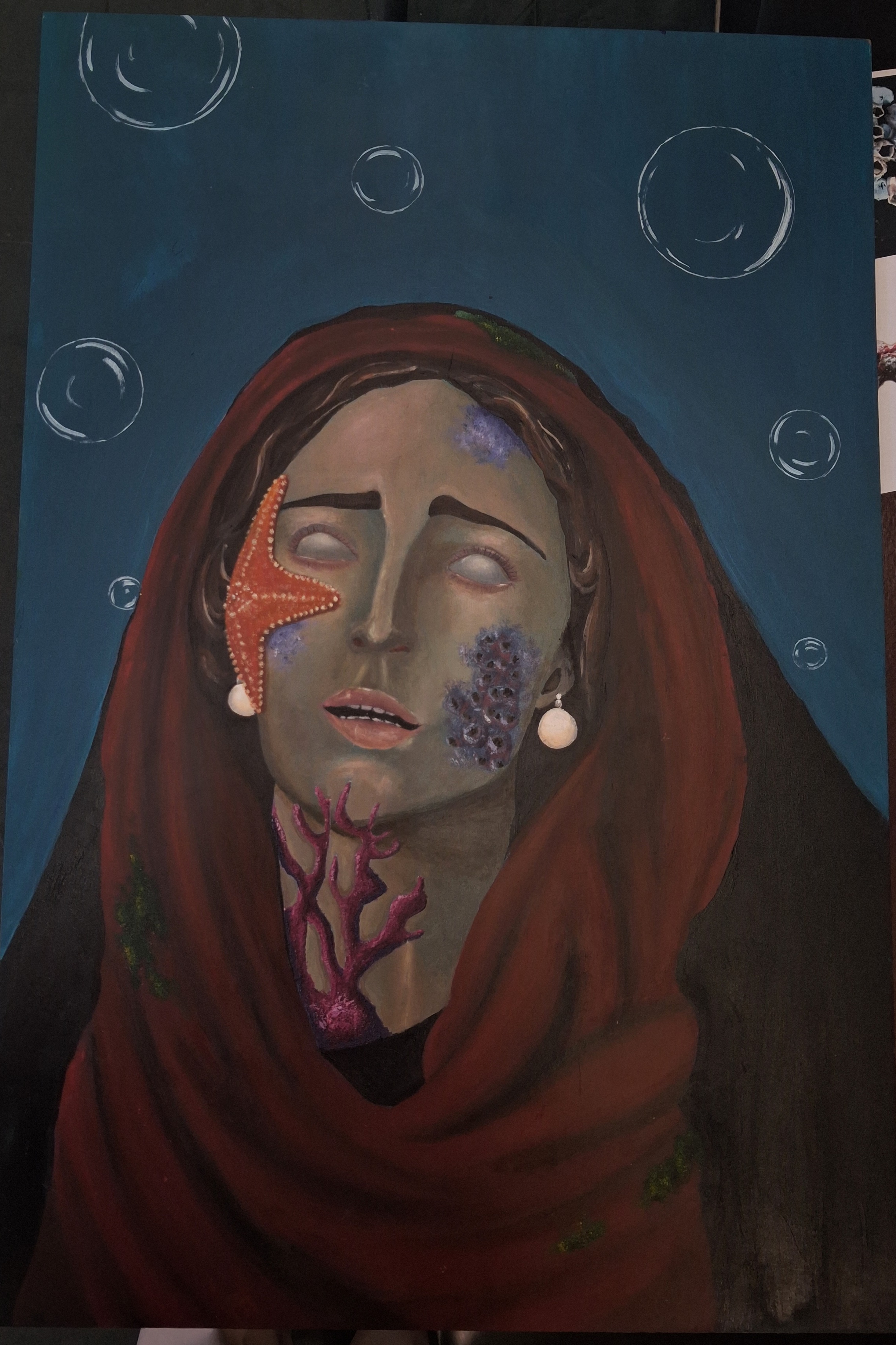 Sorrowful Devotion by Jasmine Jenkins, depicting a serene woman's face with religious iconography