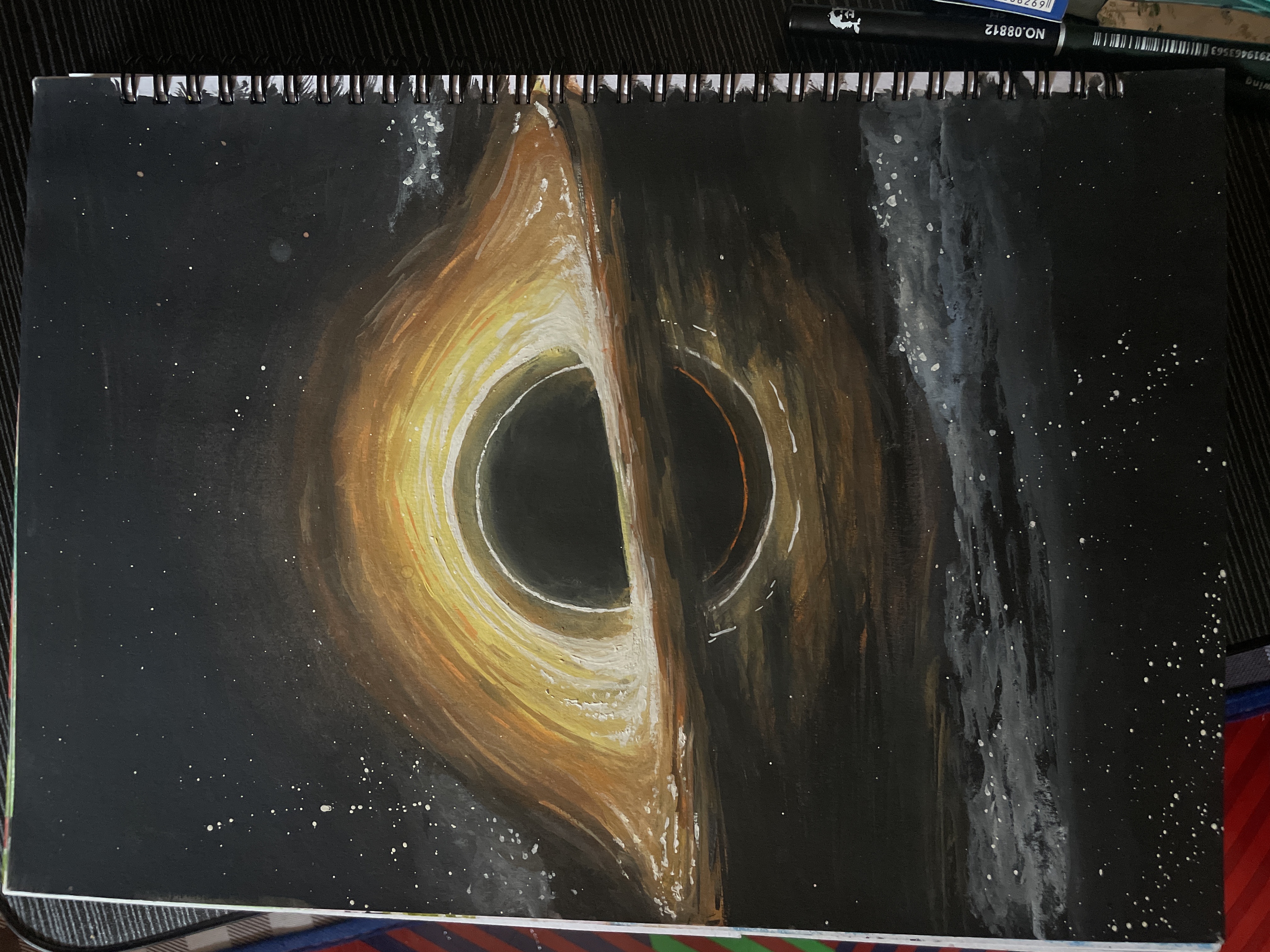 blackWHOLE by NUR AQILAH NABIHAH ANUAR, central black hole surrounded by glowing halo