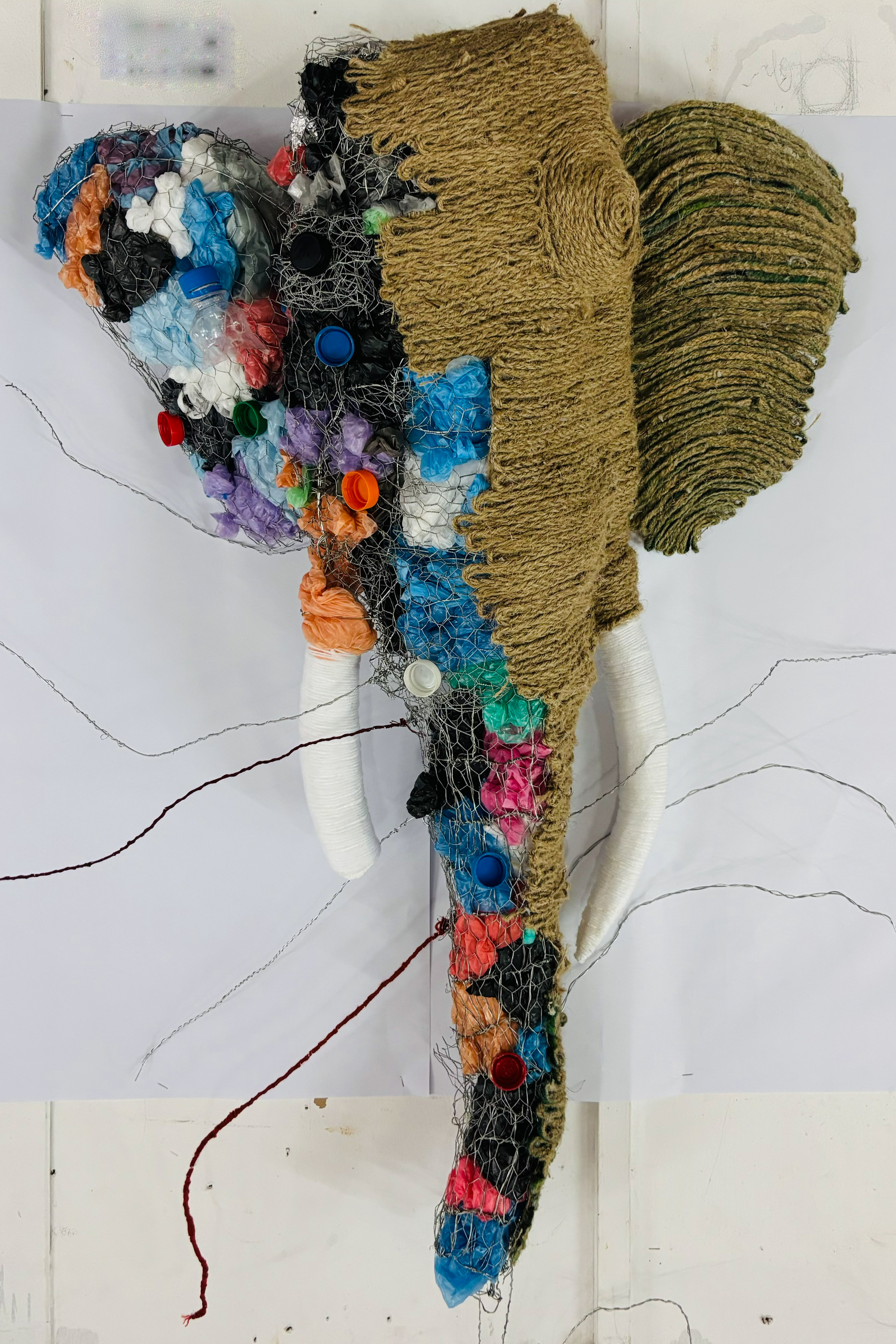The Weight of Human Waste by Ravichandran Dilochchini, elephant crafted from recycled materials
