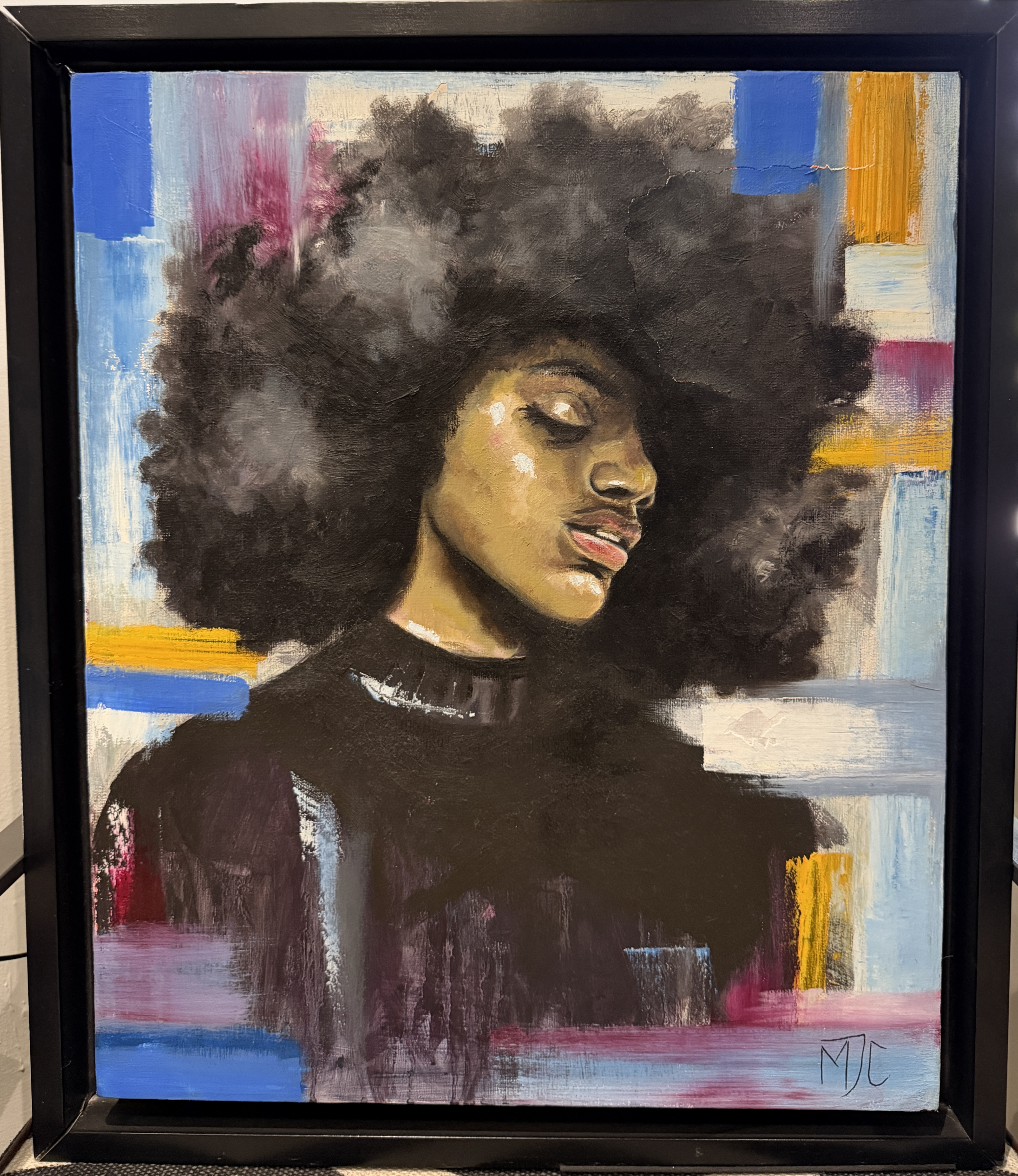 Crowned by Maricia Duvenage featuring a person with an afro hairstyle and serene expression