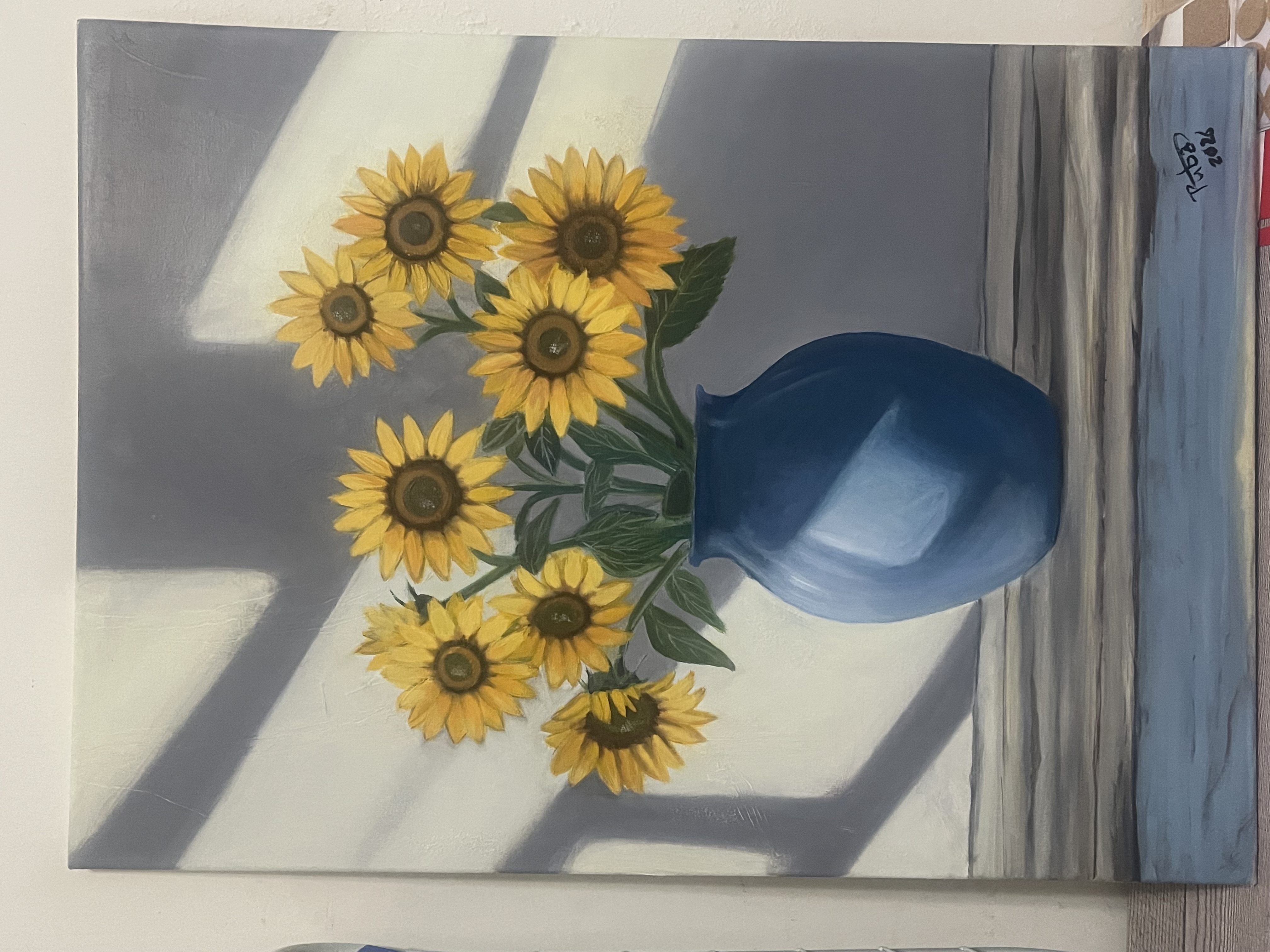 Sunflower by Ruba katato, bouquet of sunflowers in a blue vase
