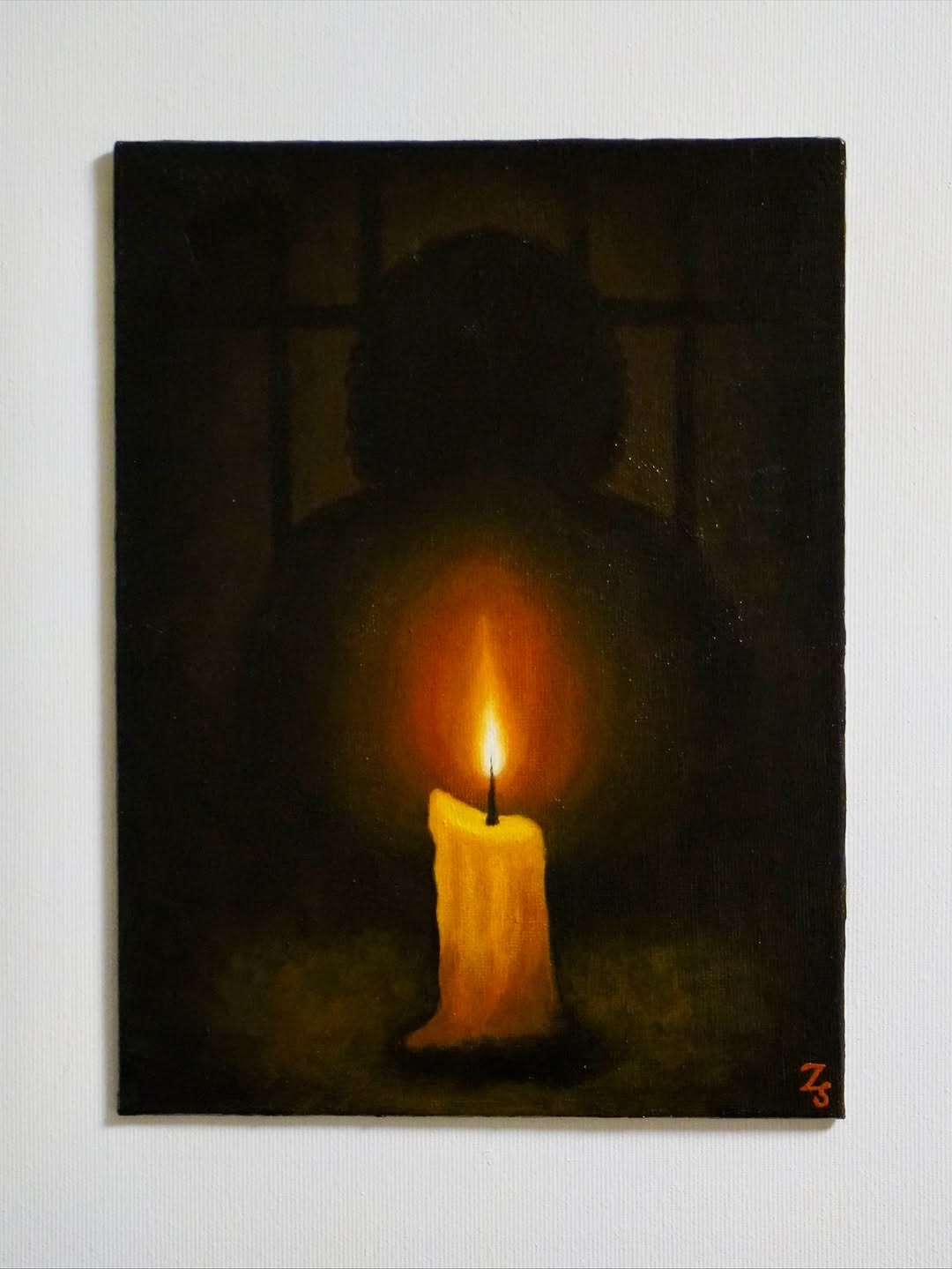 Imprisoned Light by Zahra Soltani, candle with shadowy silhouette