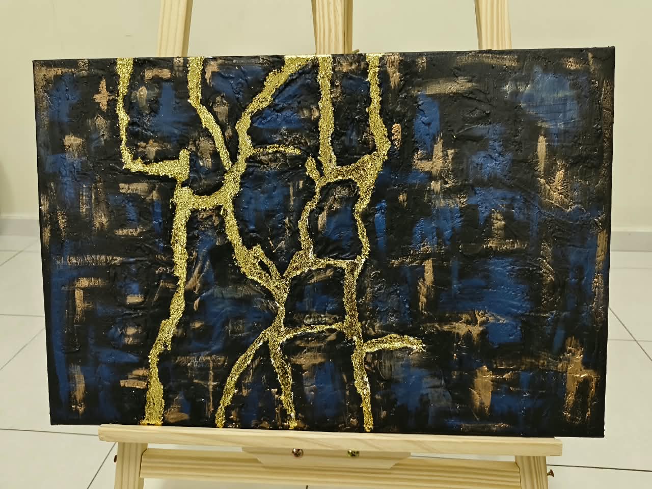 The King's Silent Legacy by Deishiga Devendran, a textured canvas with golden cracks and a dark background