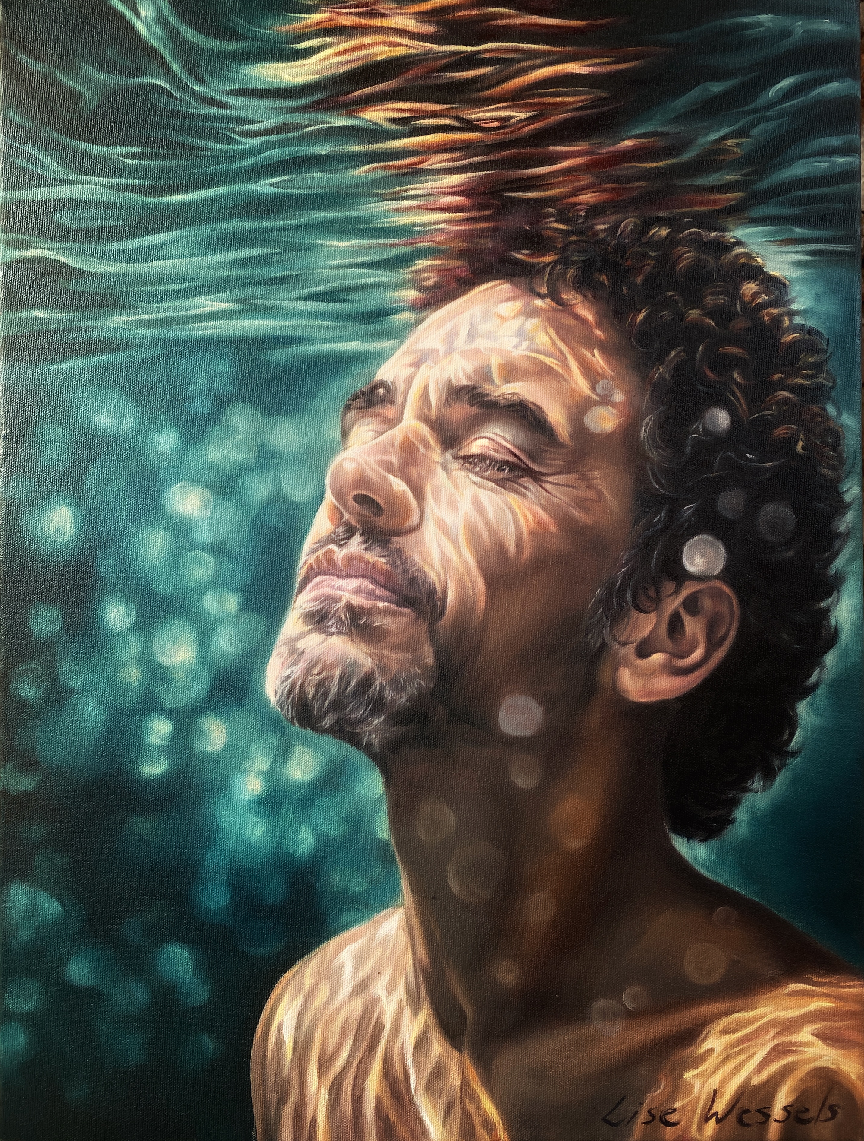Liquid Dreams by Lise Wessels, man submerged in water with closed eyes