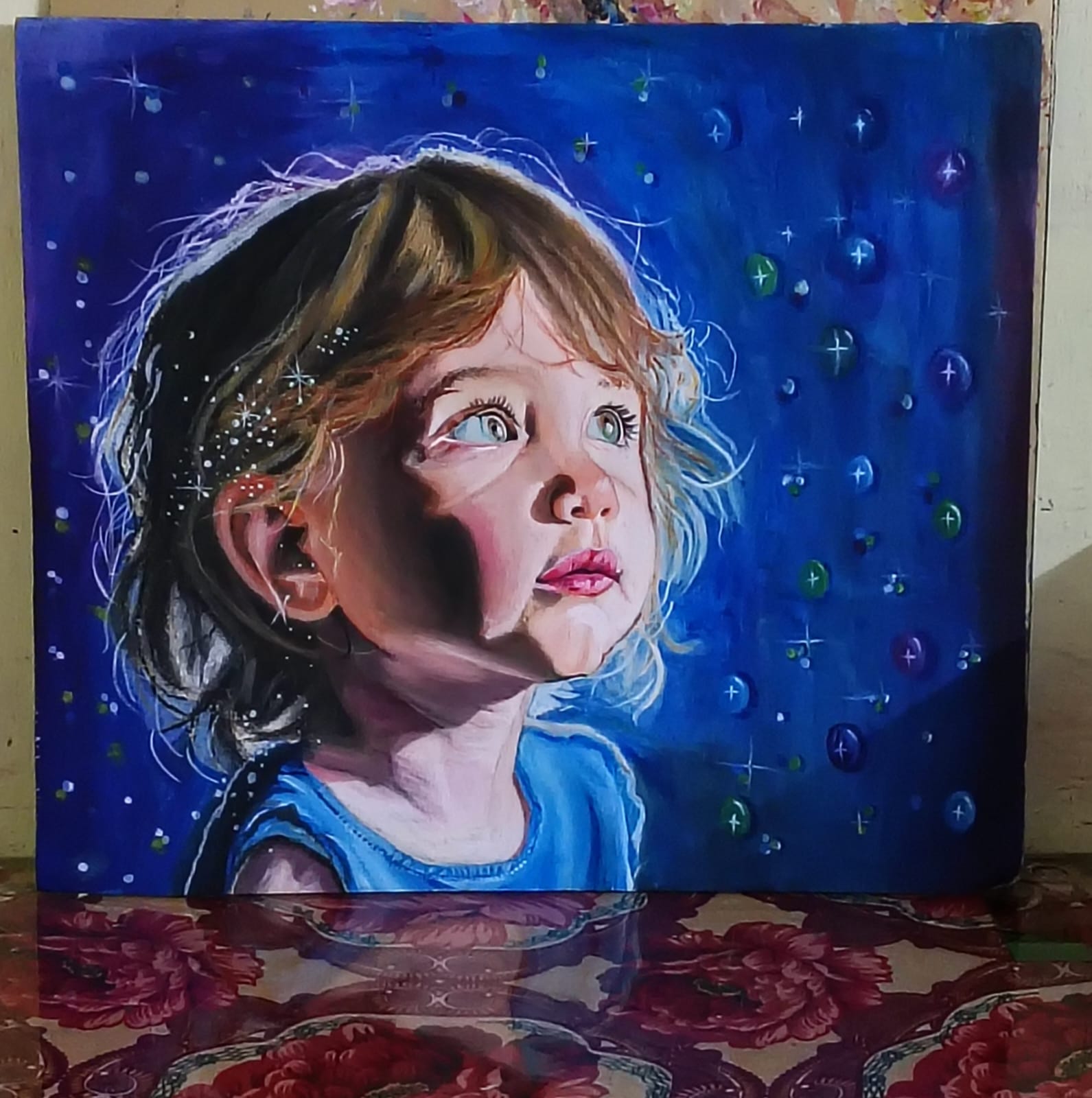 Dreams beyond infinity by Yash Patil, child gazing upwards, celestial background