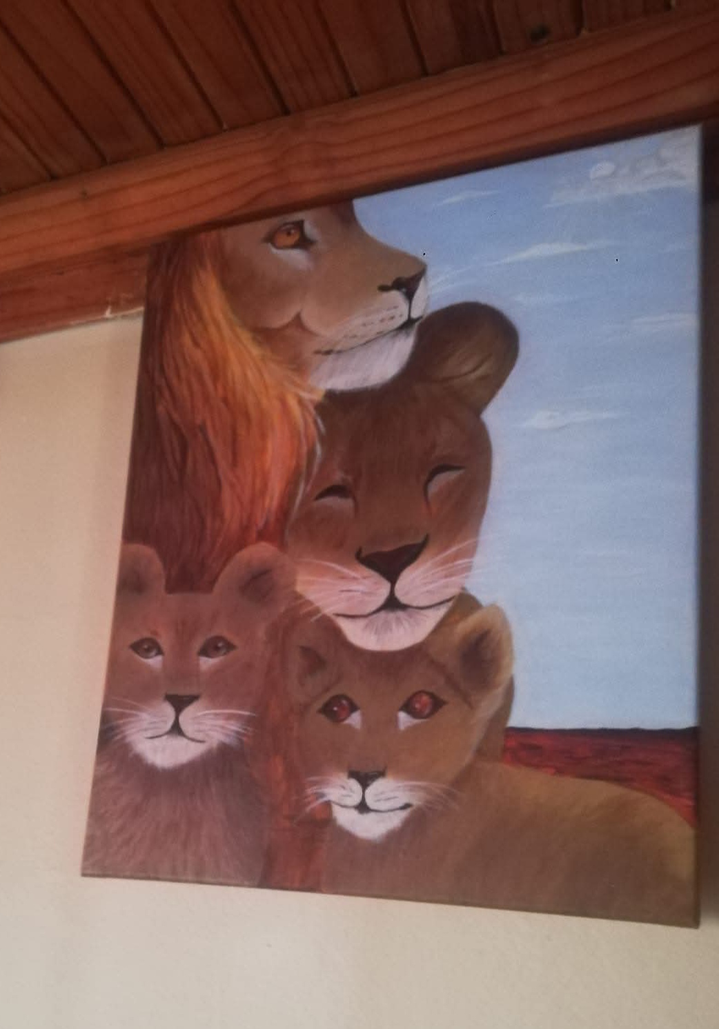 Strength within unity by Kaitlyn Sewshanker, depicts a lion family showing unity