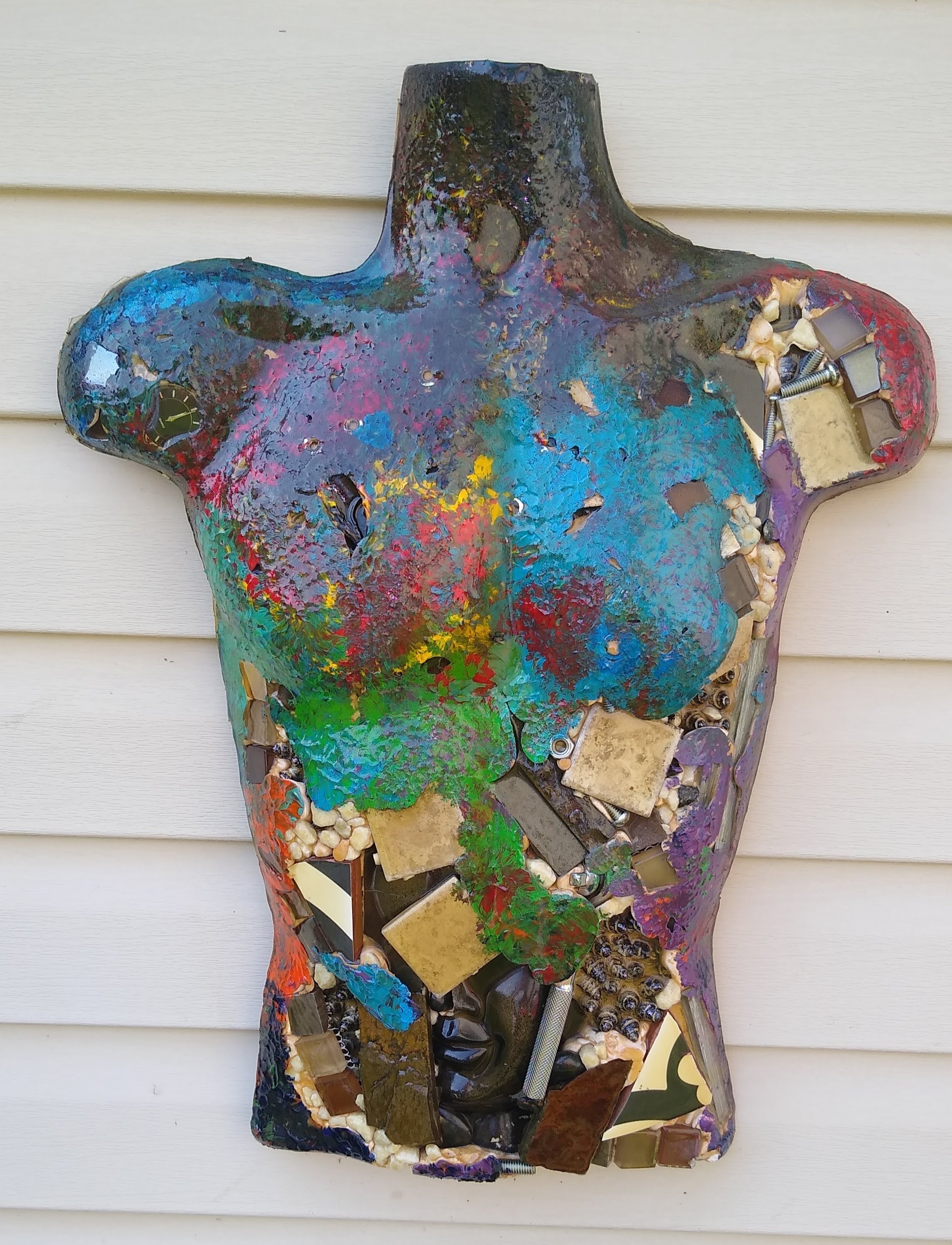 Be still by Tina Marie Beam, a vibrant mixed-media human torso sculpture