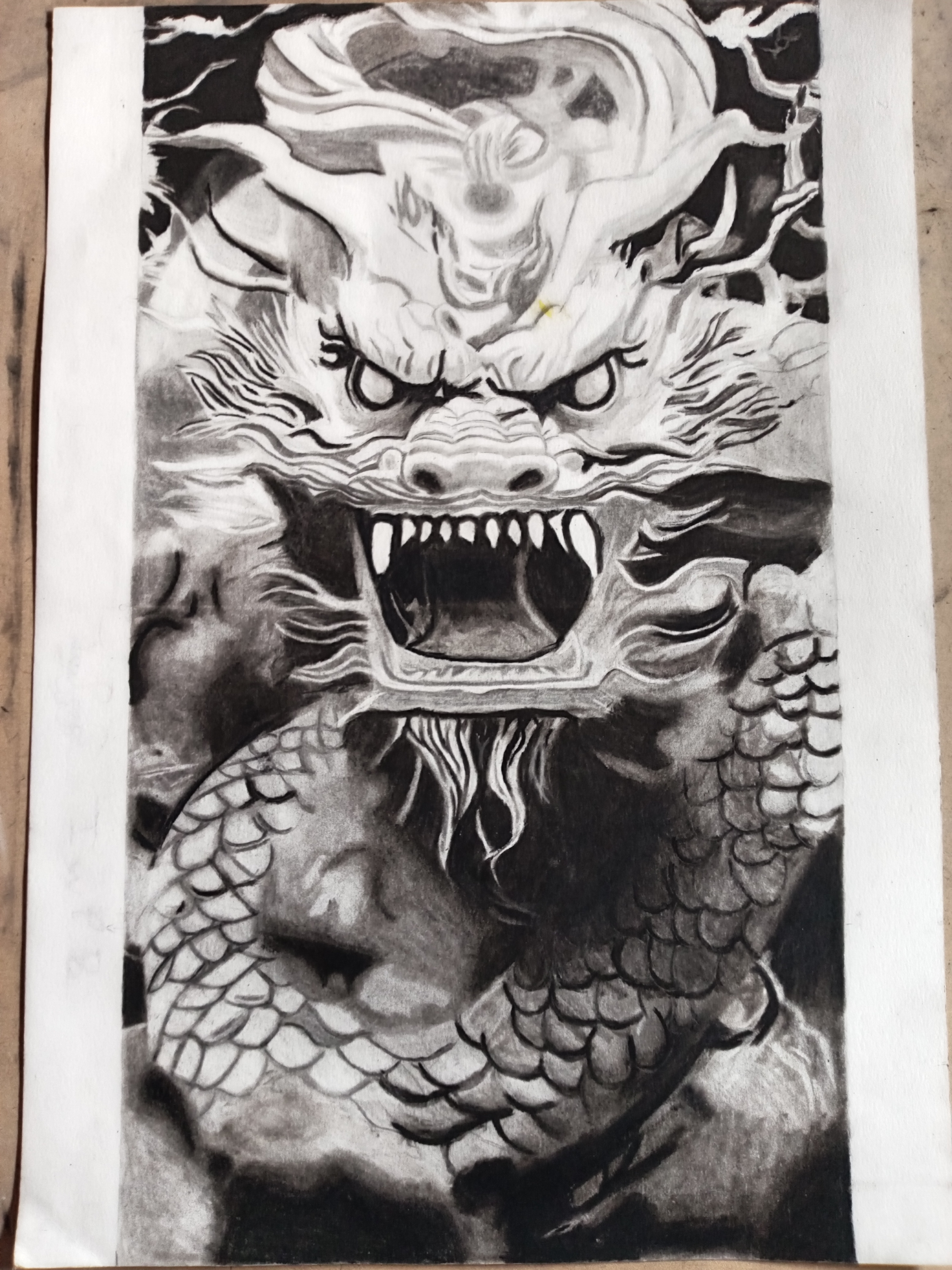 Stroke a dragon's whiskers by Ayanda Mashaba - dynamic dragon charcoal art