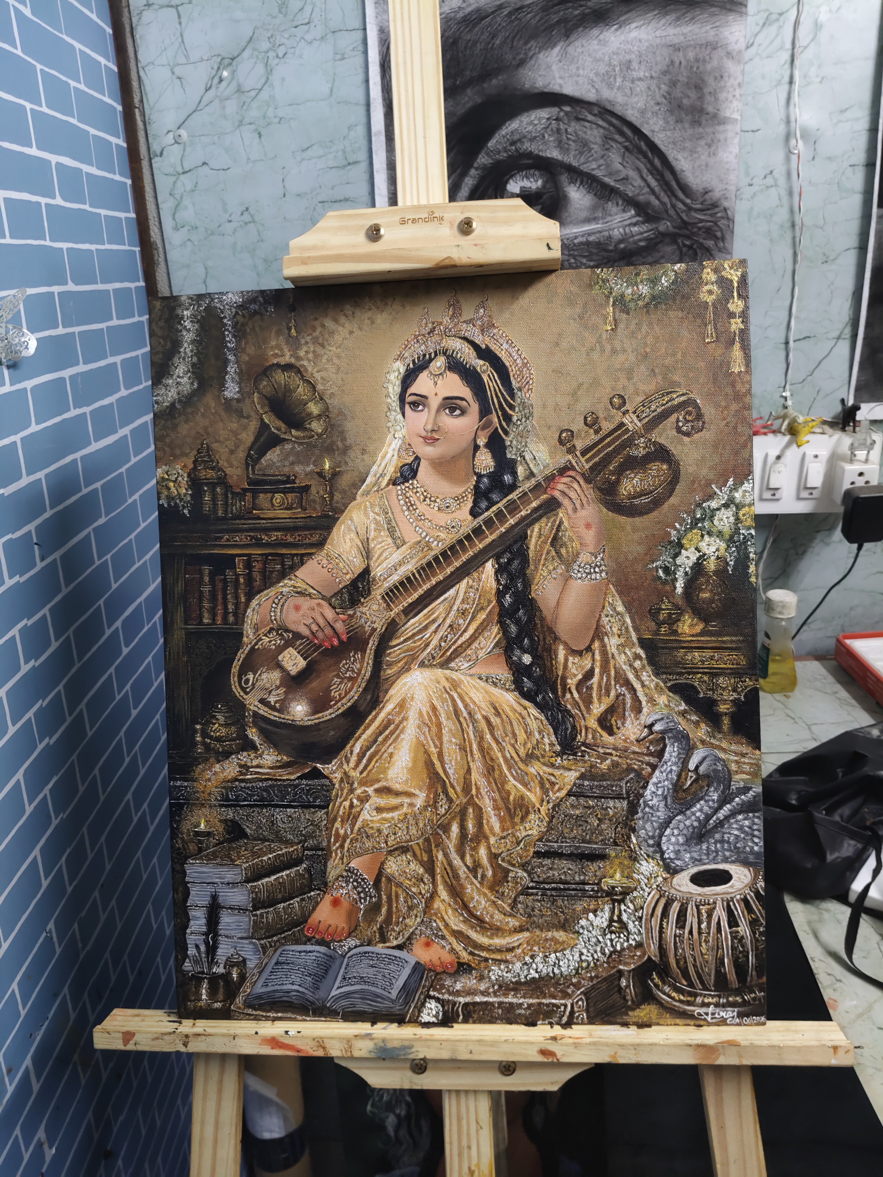 Acrylic painting by Viraj Kumar depicting a seated figure in golden garment with a Veena