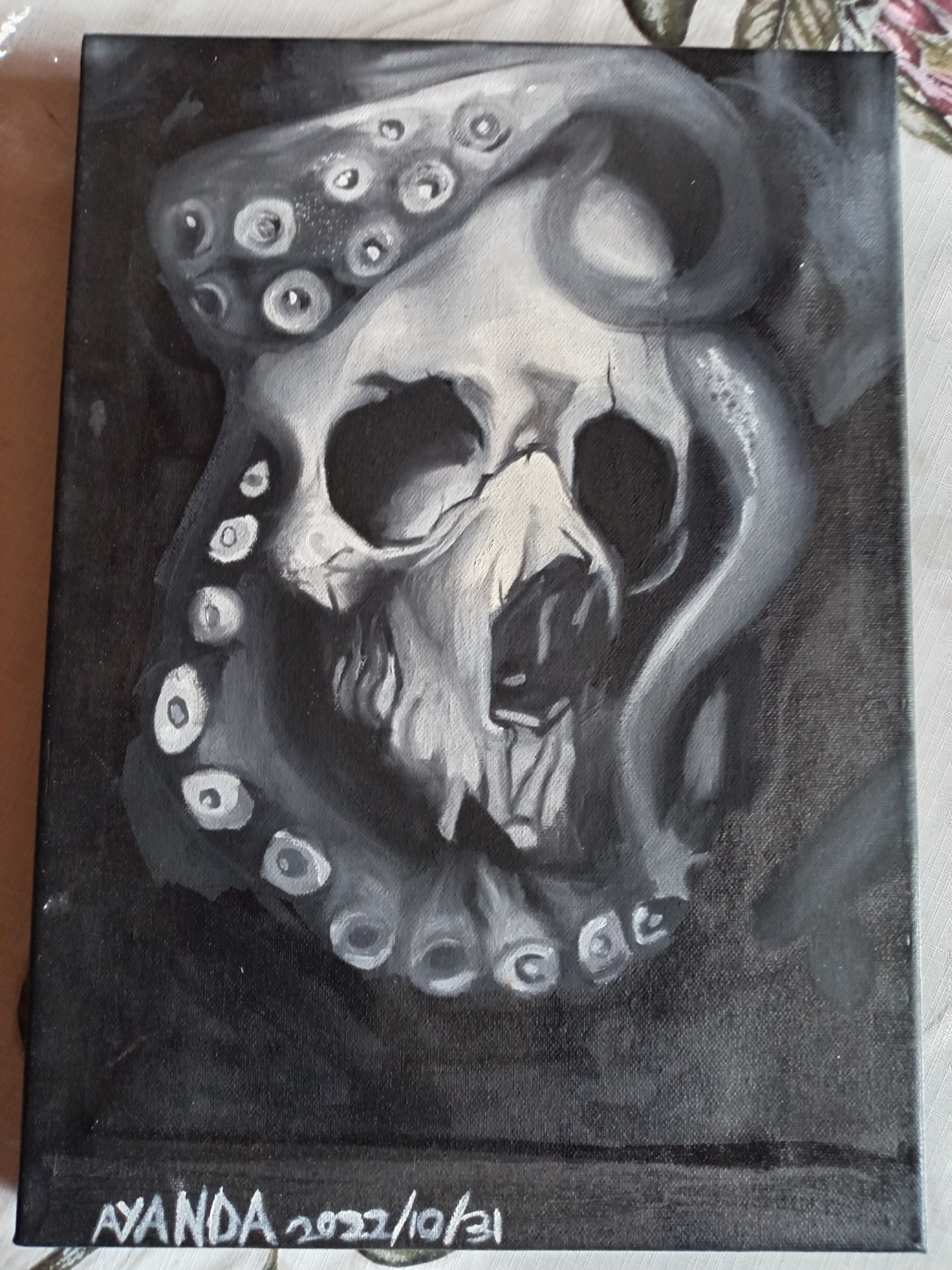 The Kraken's Kiss by Ayanda Mashaba, a skull entwined with an octopus tentacle