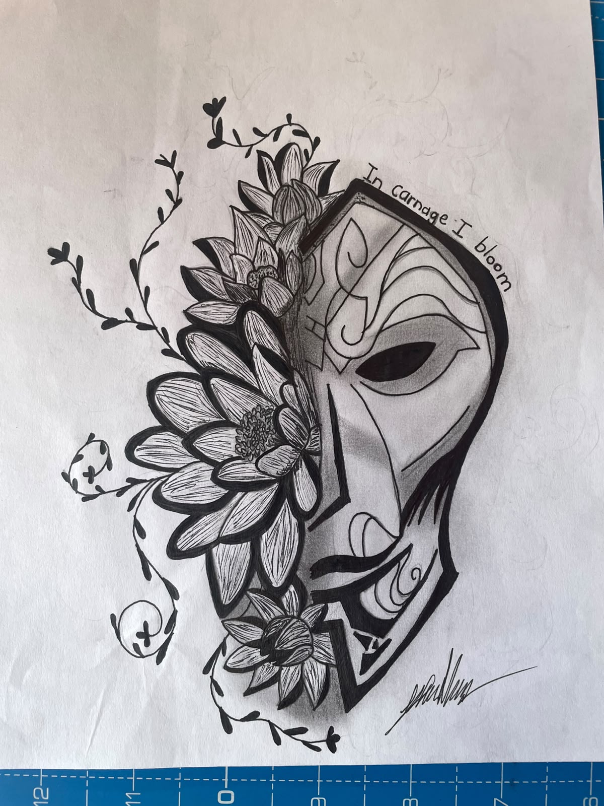 The blooming mask by Gillian van den Heever, a mask split into floral and geometric patterns
