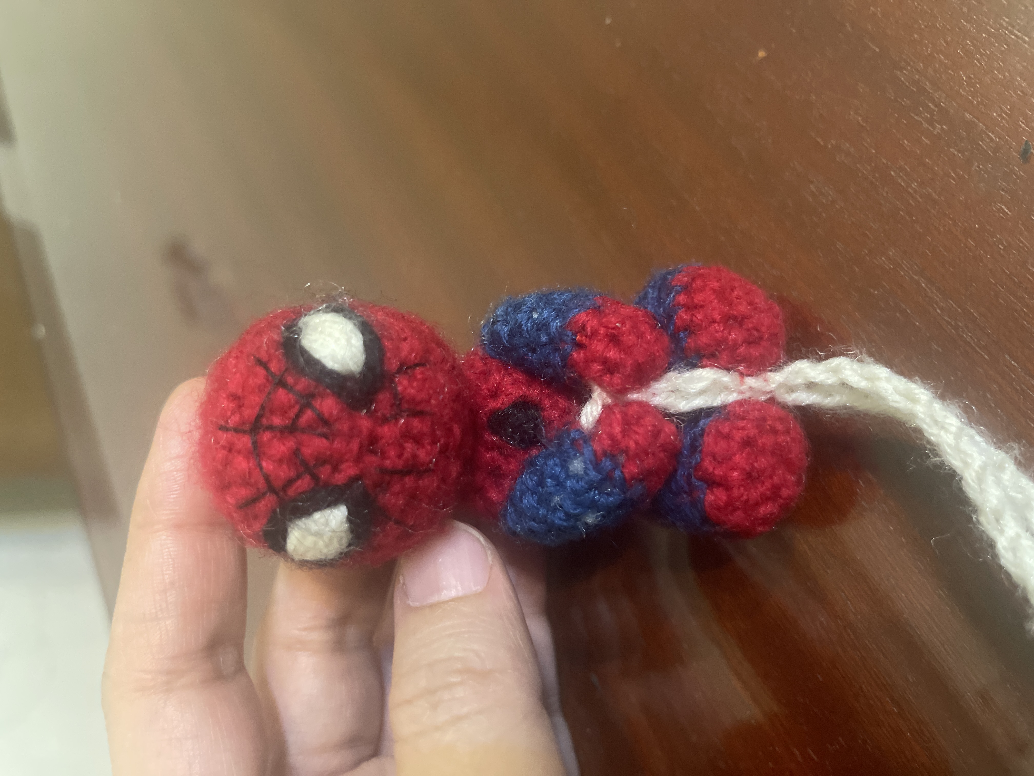 The Ultimate Web slinger by Lubabah khan, handcrafted Spider-Man crochet sculpture