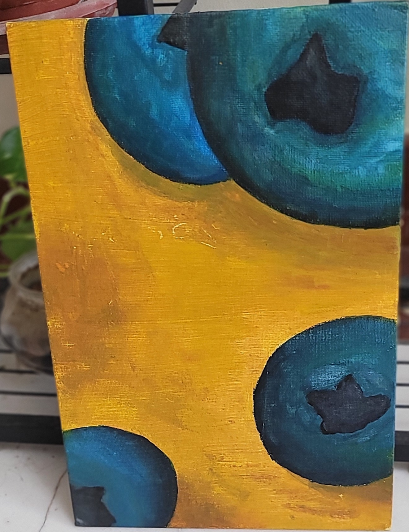Blueberries by Chryslyn Giselle Pacheco featuring blueberries on bright surface