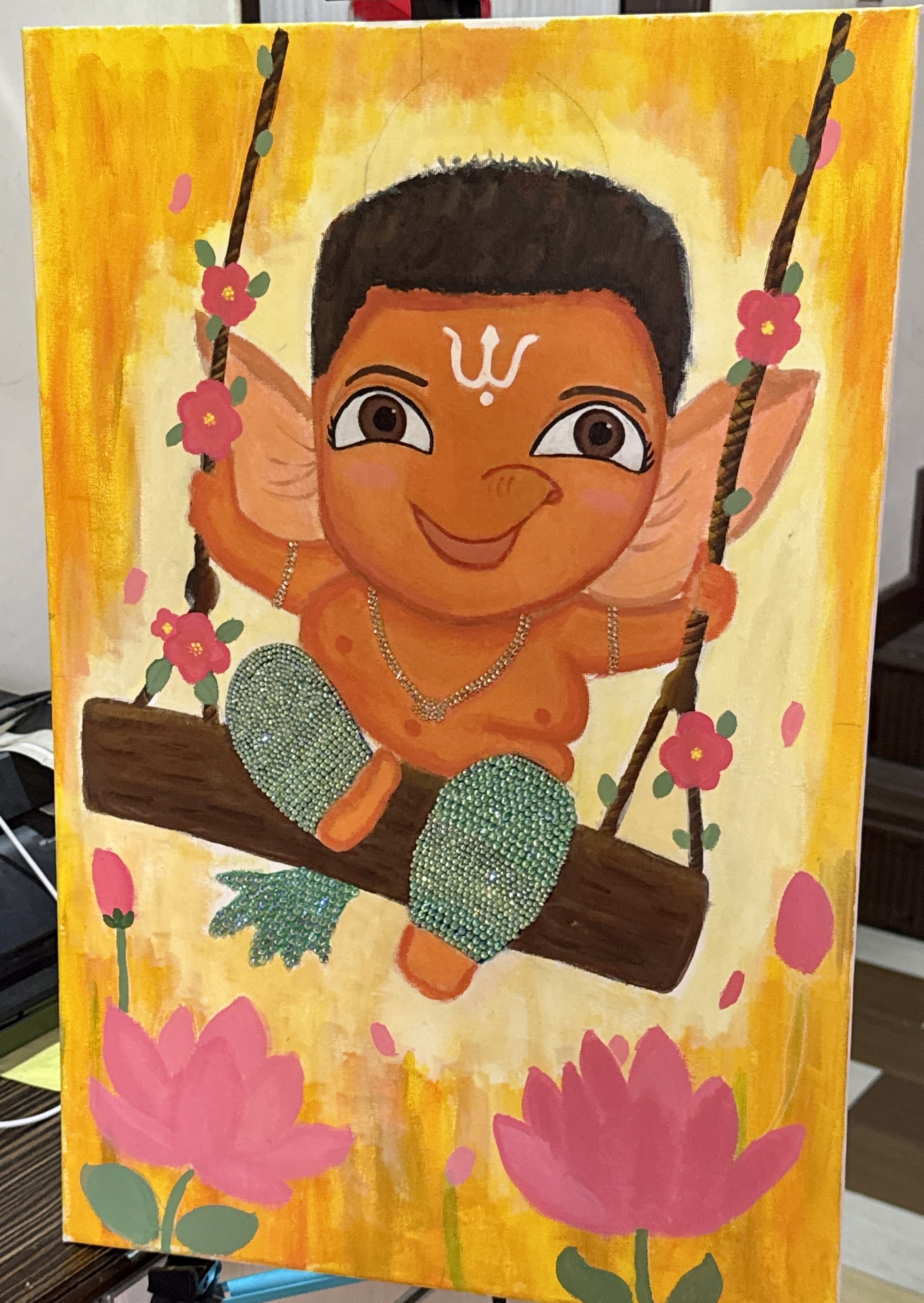 Ganesha In Joy by Deviyaa Manimaran, depicting Hindu deity on swing
