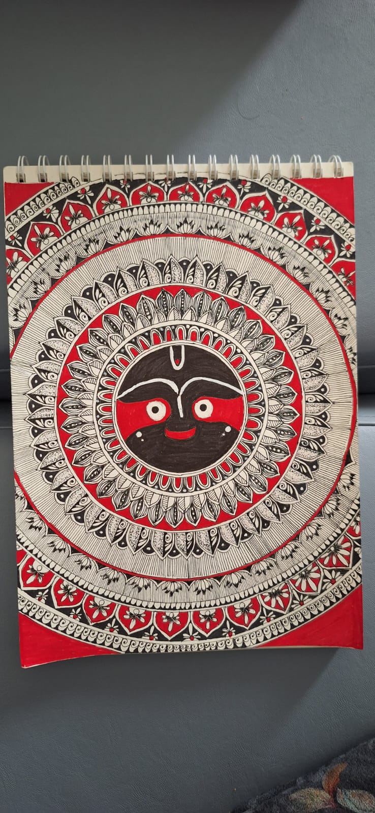 Manadala Art by Bhuvana somalinga featuring Lord Jagannath's face with bold patterns