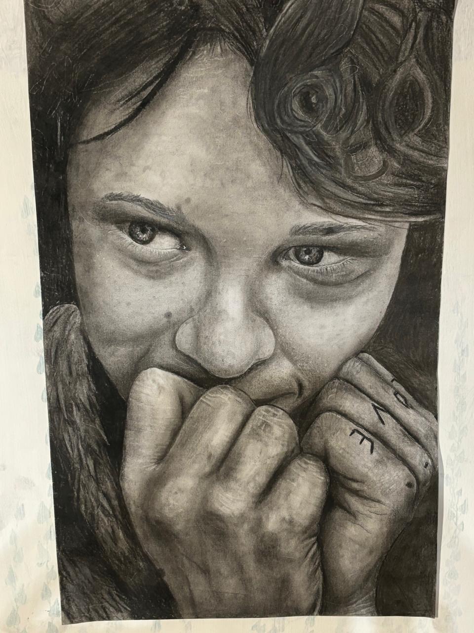 Vulnerability in Ink by Eerin Reintjes, close-up portrait with expressive eyes and hands