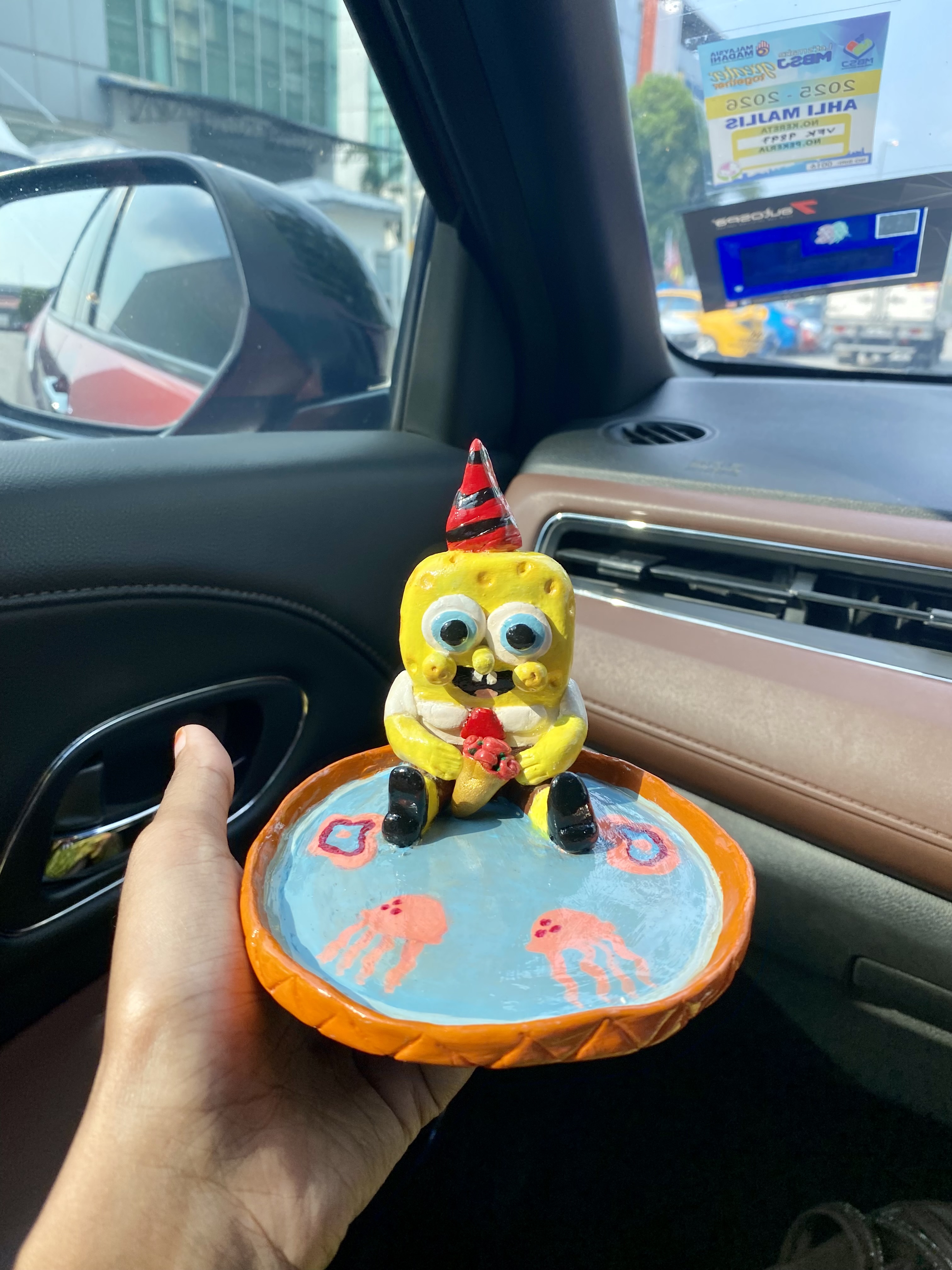 Bikini Bottom in Clay by Deviyaa Manimaran - handcrafted clay model with party hat
