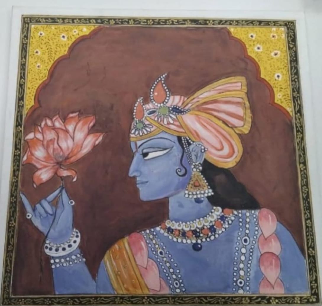 Krishna: A symbol of Eternal Beauty by Gopika Maya Nair, depicting Krishna with blue complexion and lotus
