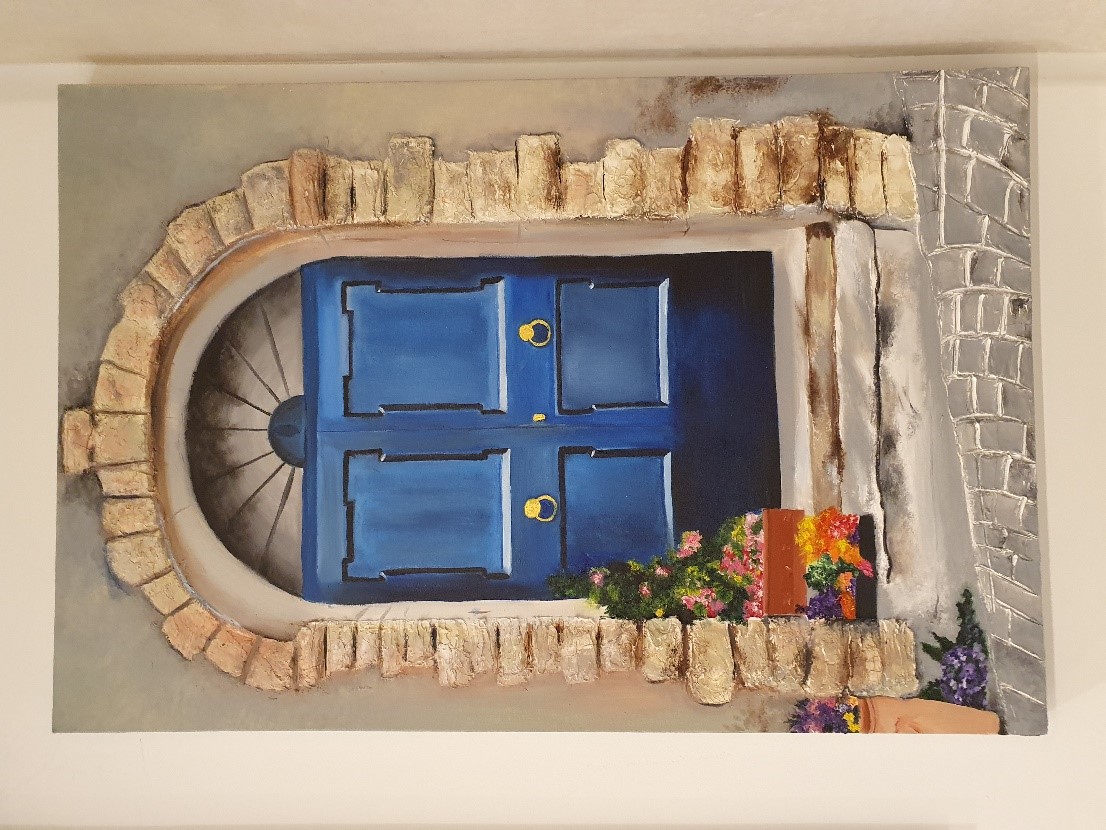 Whispers of Home by Bhargav Chandrasekar featuring a blue door and textured bricks