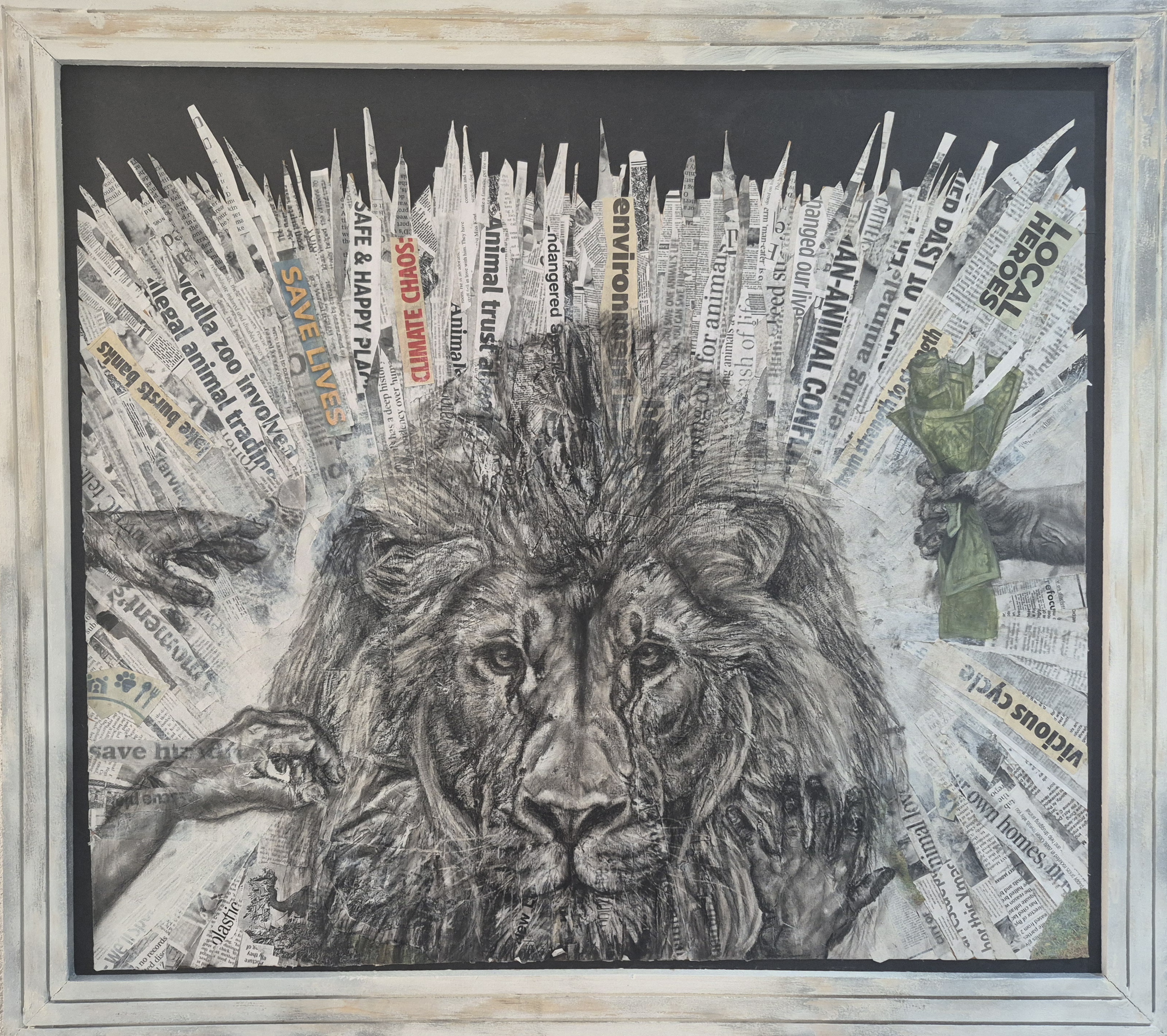 Leader of the brave by Anuschka de Jager, lion face in black and white with newspaper clippings
