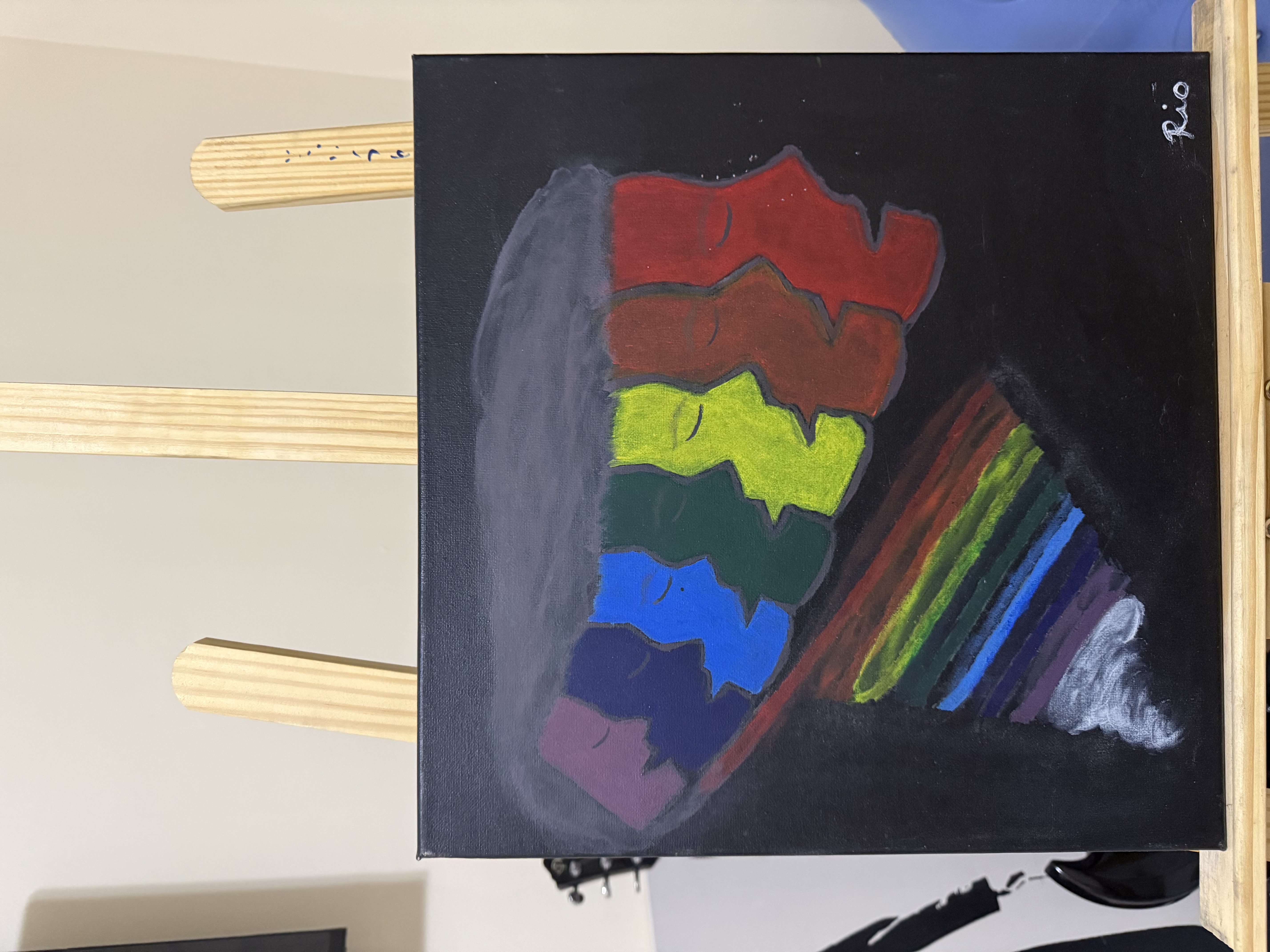 Fragments of the self by Rosario Lopez, a layered rainbow-colored human face