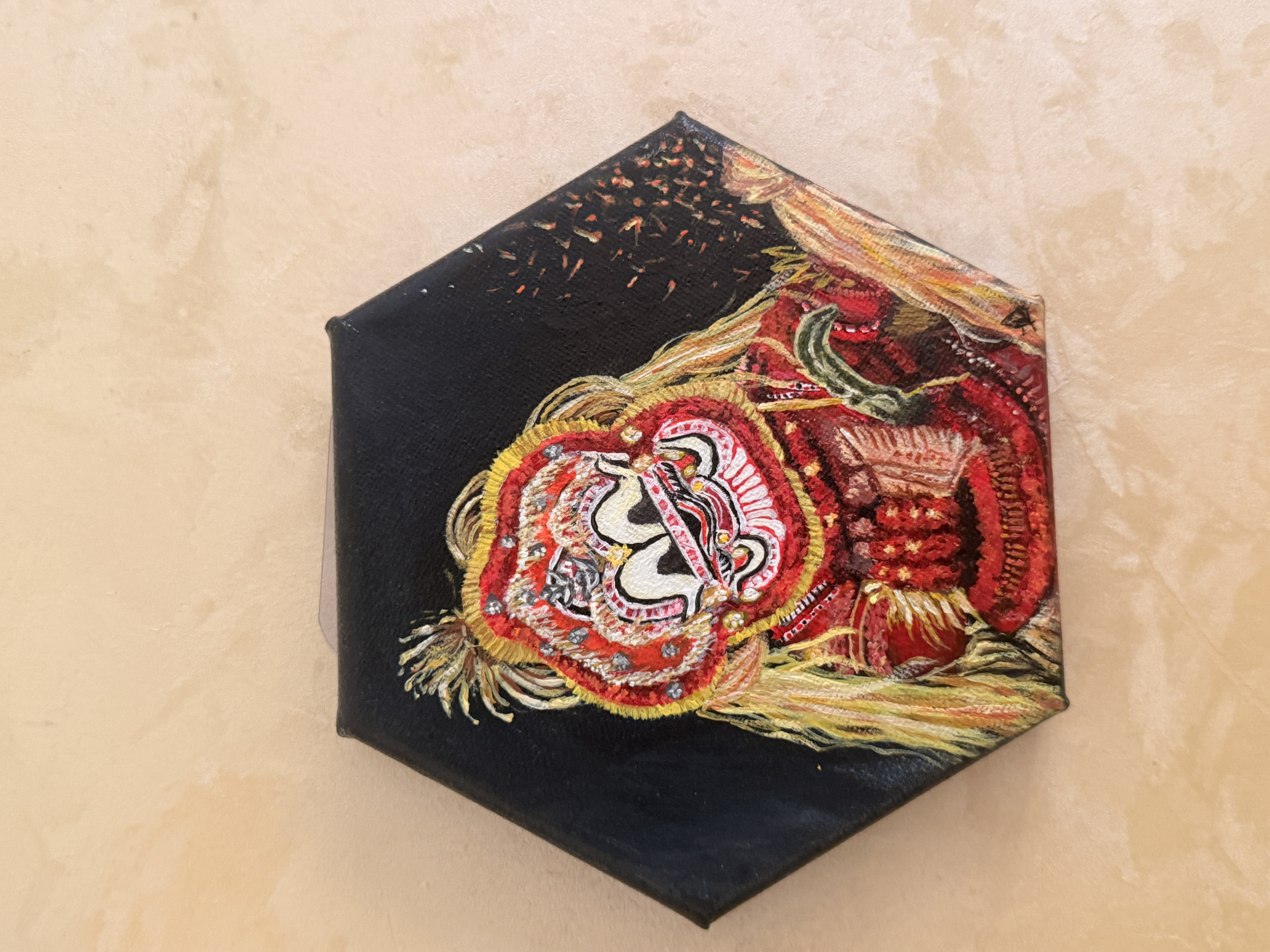 `Acrylic Paint canvas by Thriveni Rajesh, depicting a Theyyam performer with vivid colors and intricate traditional headgear