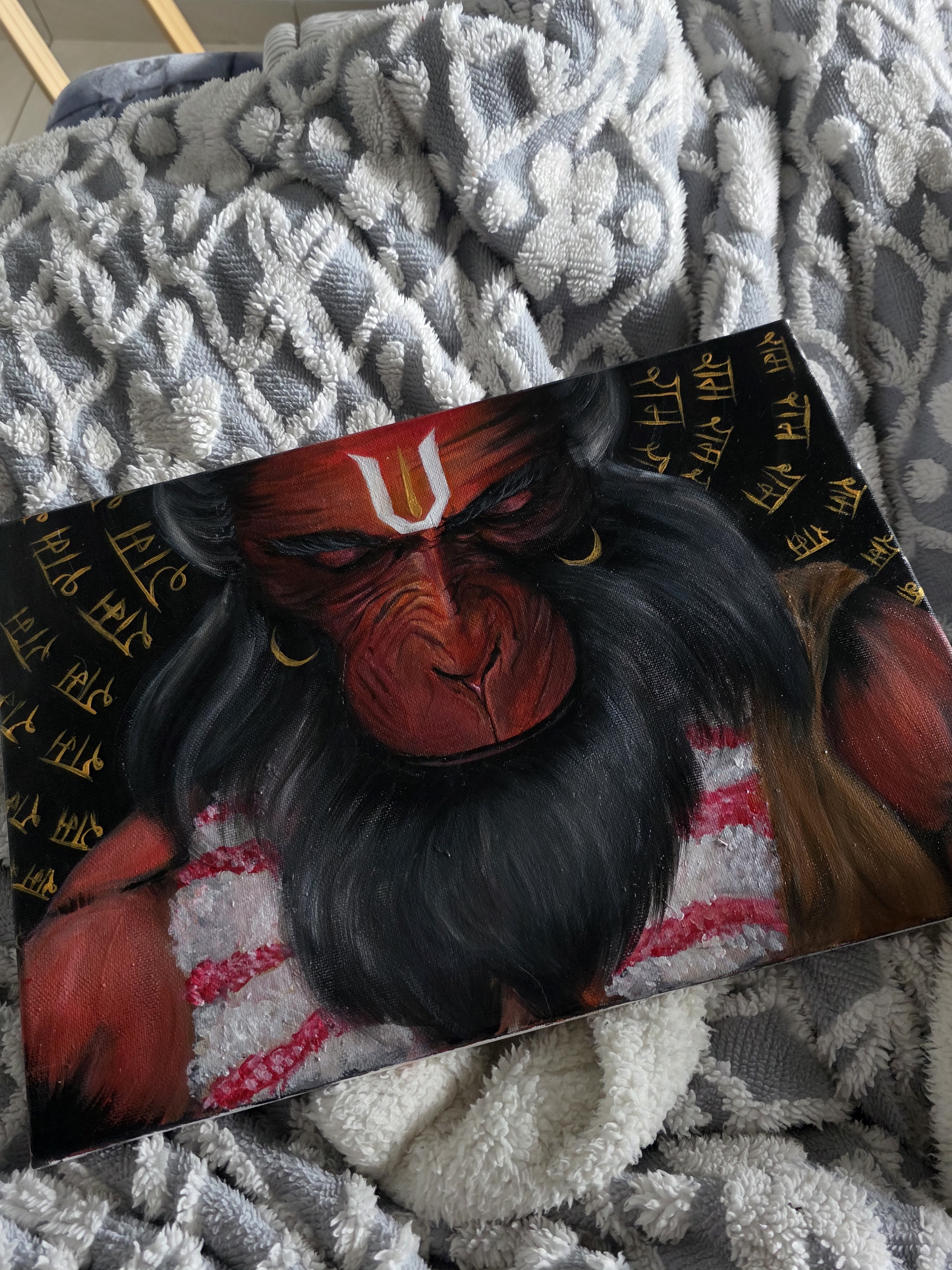 The Fire of Devotion by Krisha Madhav, a powerful portrayal of Hanuman with deep reds and blacks