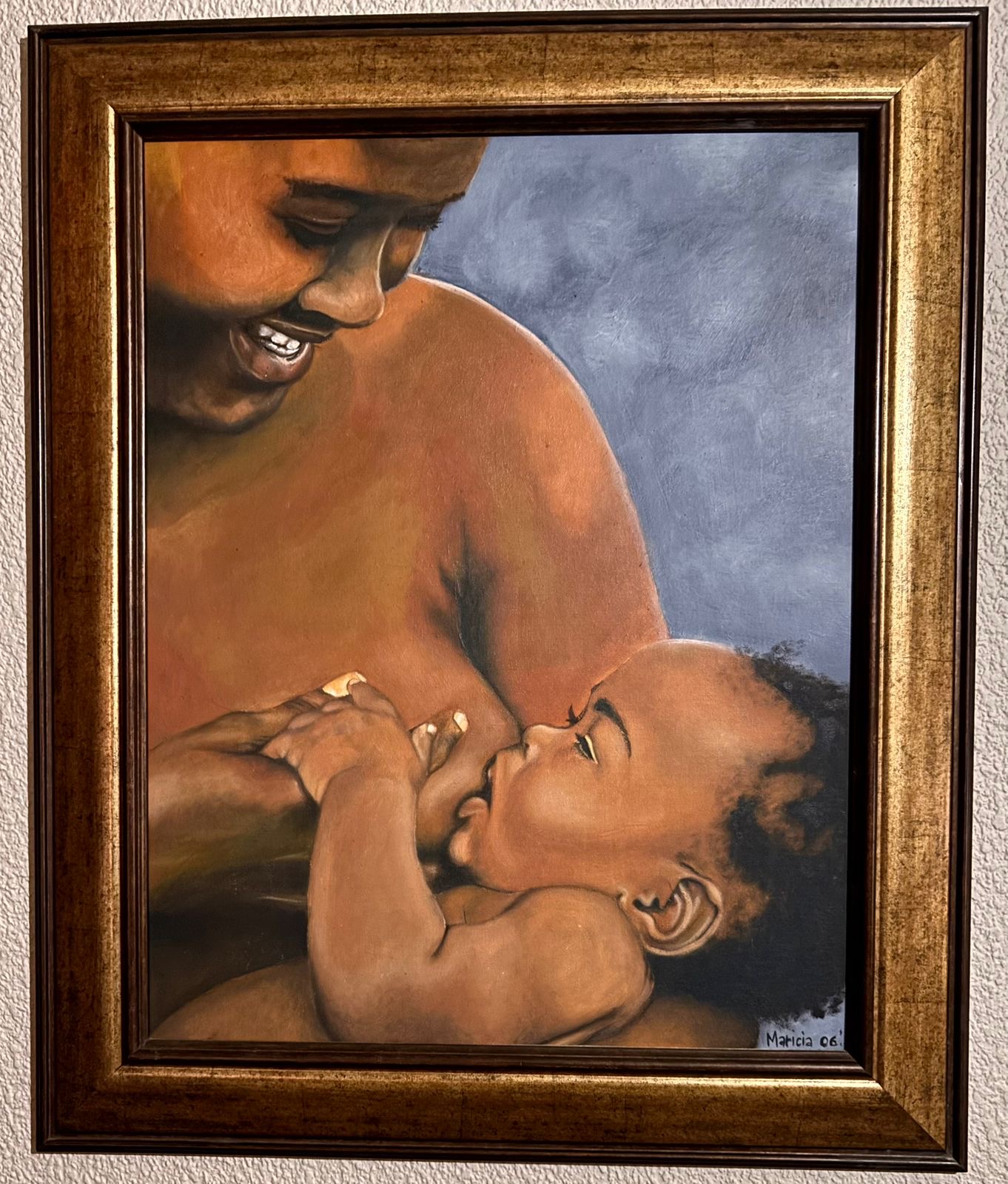 The First Language by Maricia Duvenage - framed portrait of mother and child with warm earth tones