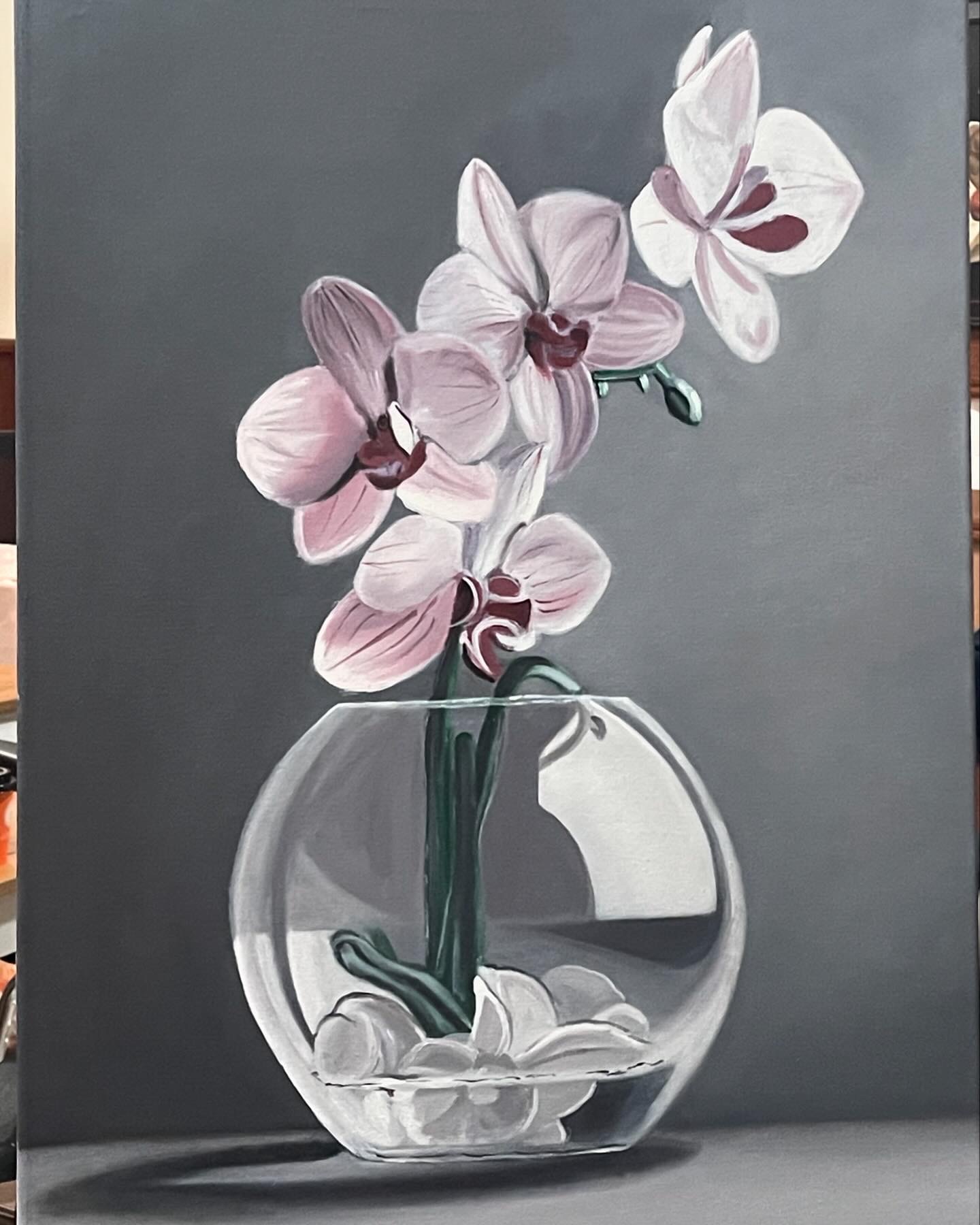 Orchid in vase by Ruba katato, featuring delicate orchids in a glass vase