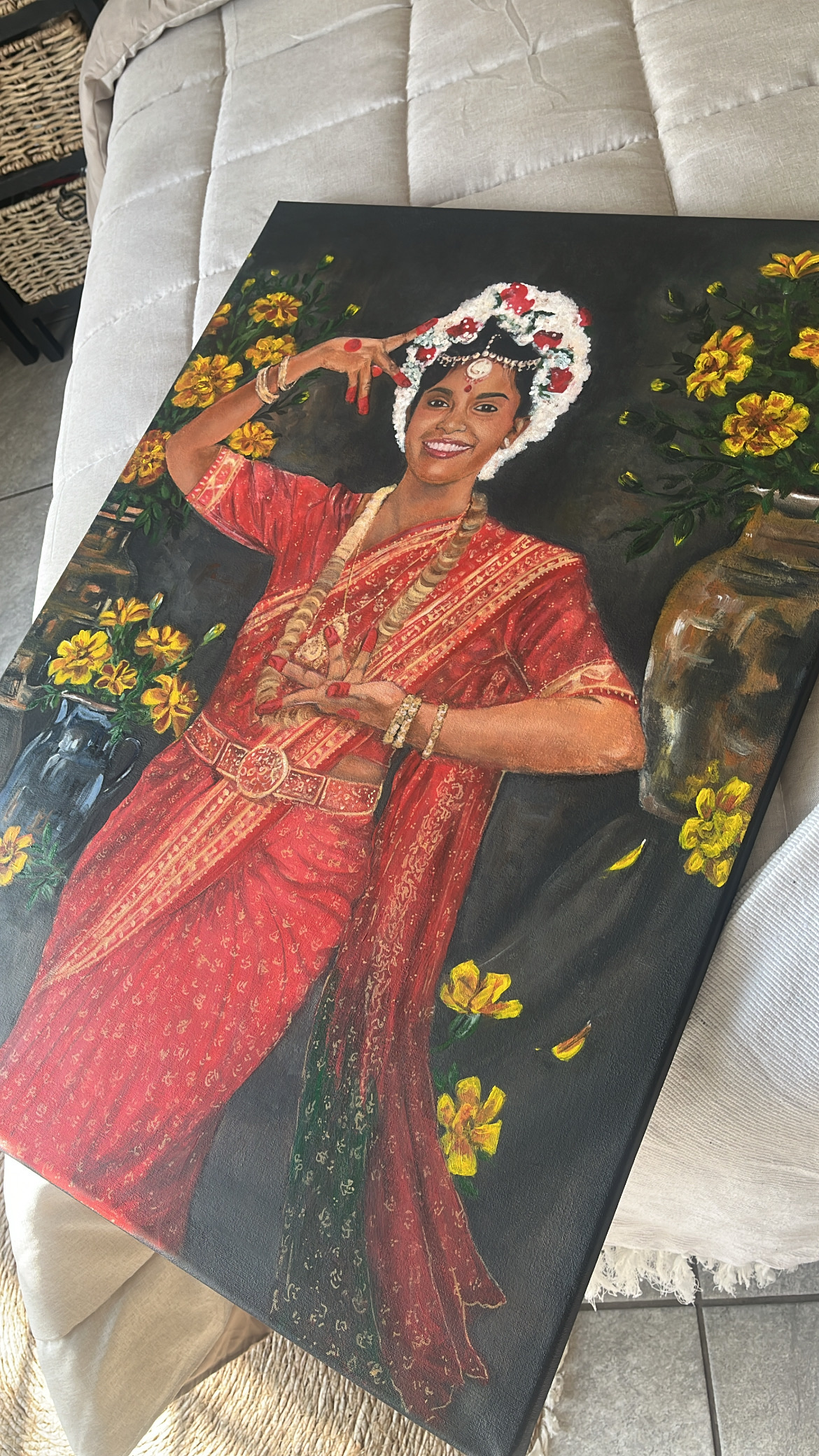 Mom by Ashlyn Govender, woman in traditional red sari with gold patterns