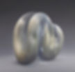 Three luminous interlocking ribbed circular forms by Rafael Salazar composed of repeated translucent concentric layers, Motionalism™, 2026.