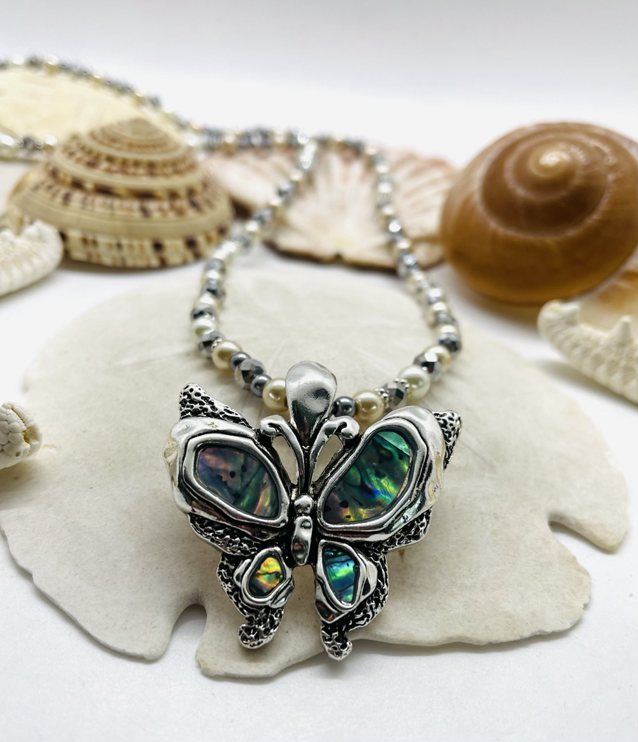 Butterfly beaded necklace pendant is mother of pearl 