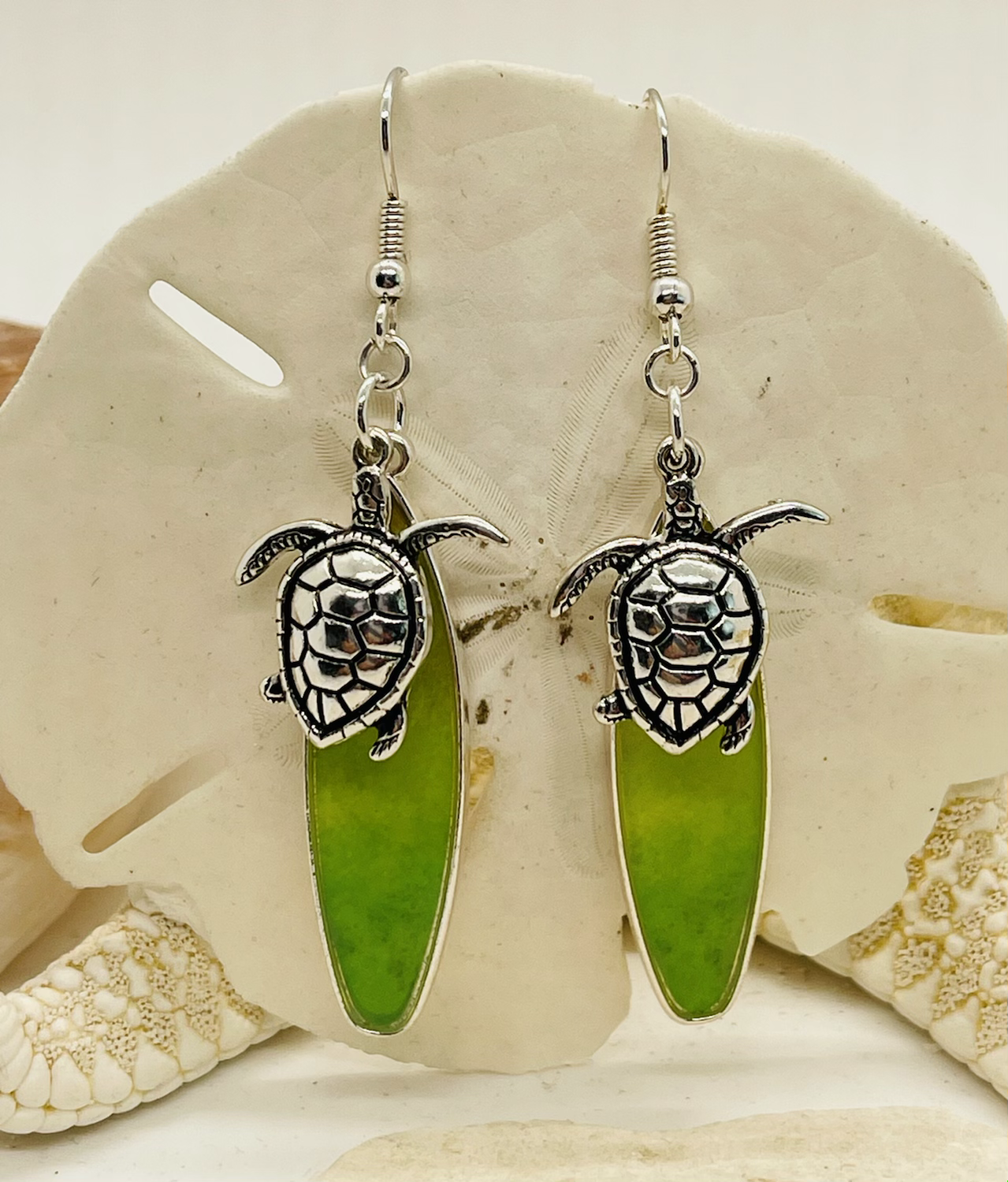 Turtle earrings on surfboards 