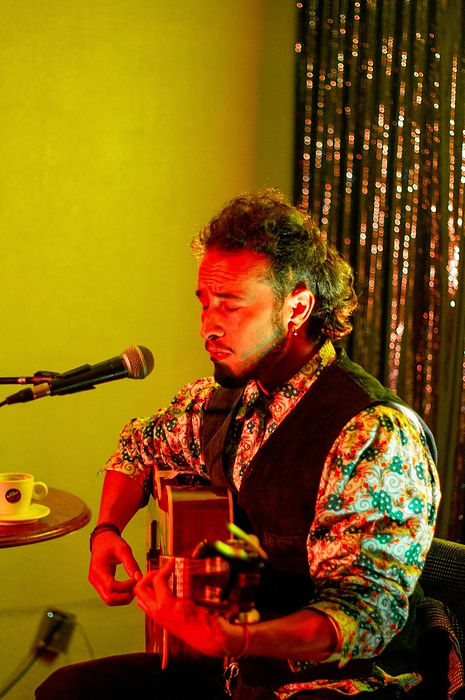 a man playing guitar