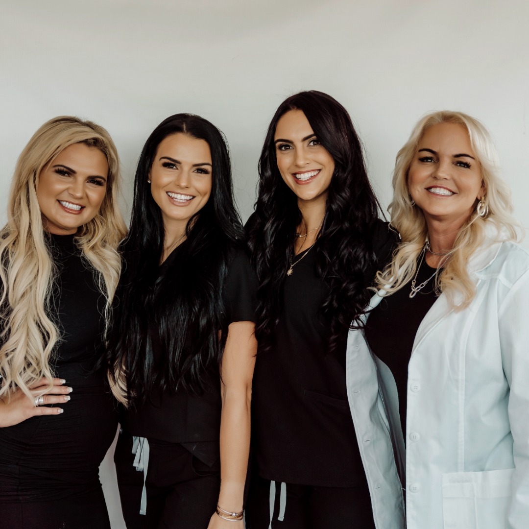 Four beauty professionals photographed together at Entyre