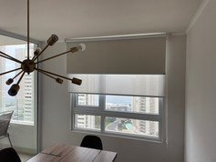 Cortinas roller motorizadas con control remoto en departamento en Santiago