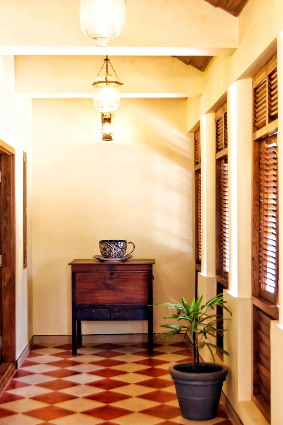 a wooden table with a cup on top of it